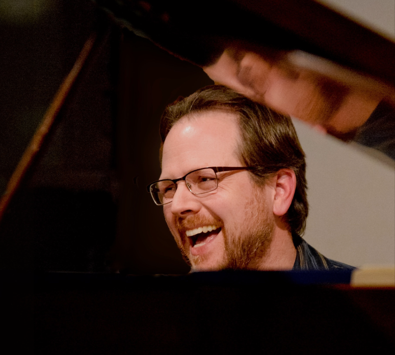 Peter John Stoltzman at the piano