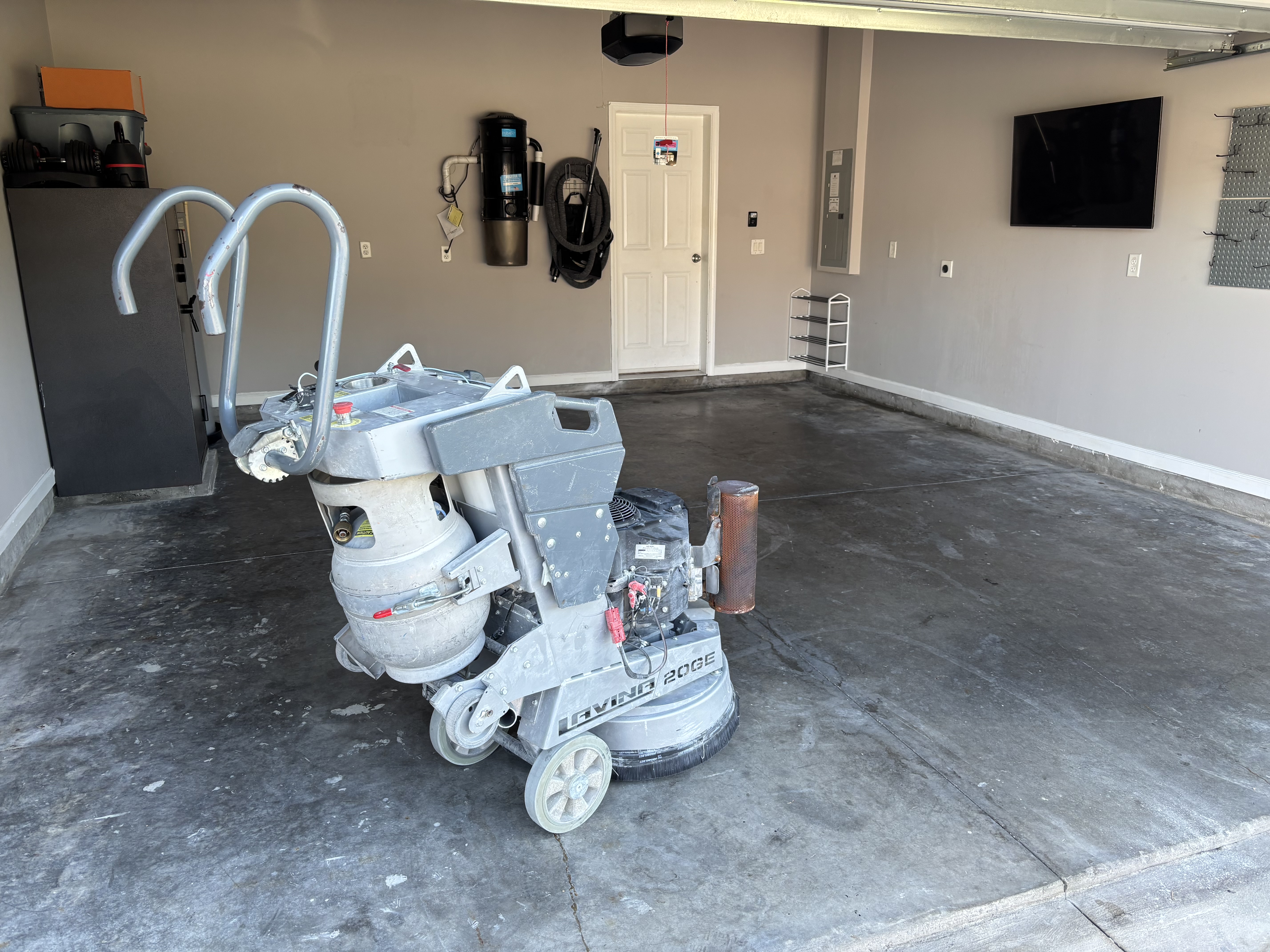 Garage Concrete Transformation — plain concrete before coating