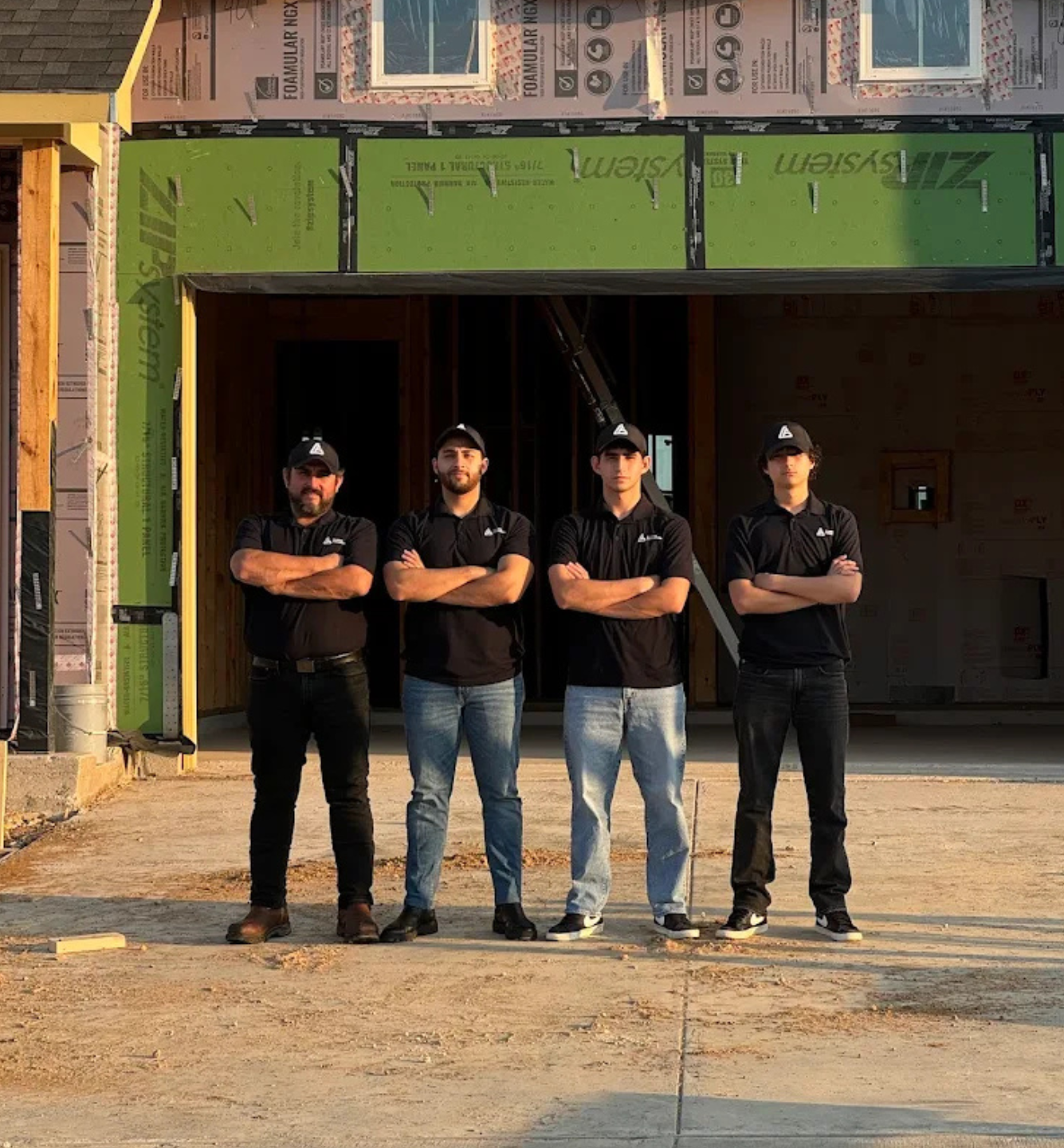 Alonso Innovation remodeling team standing in front of a new home construction project in Fort Worth, Texas.