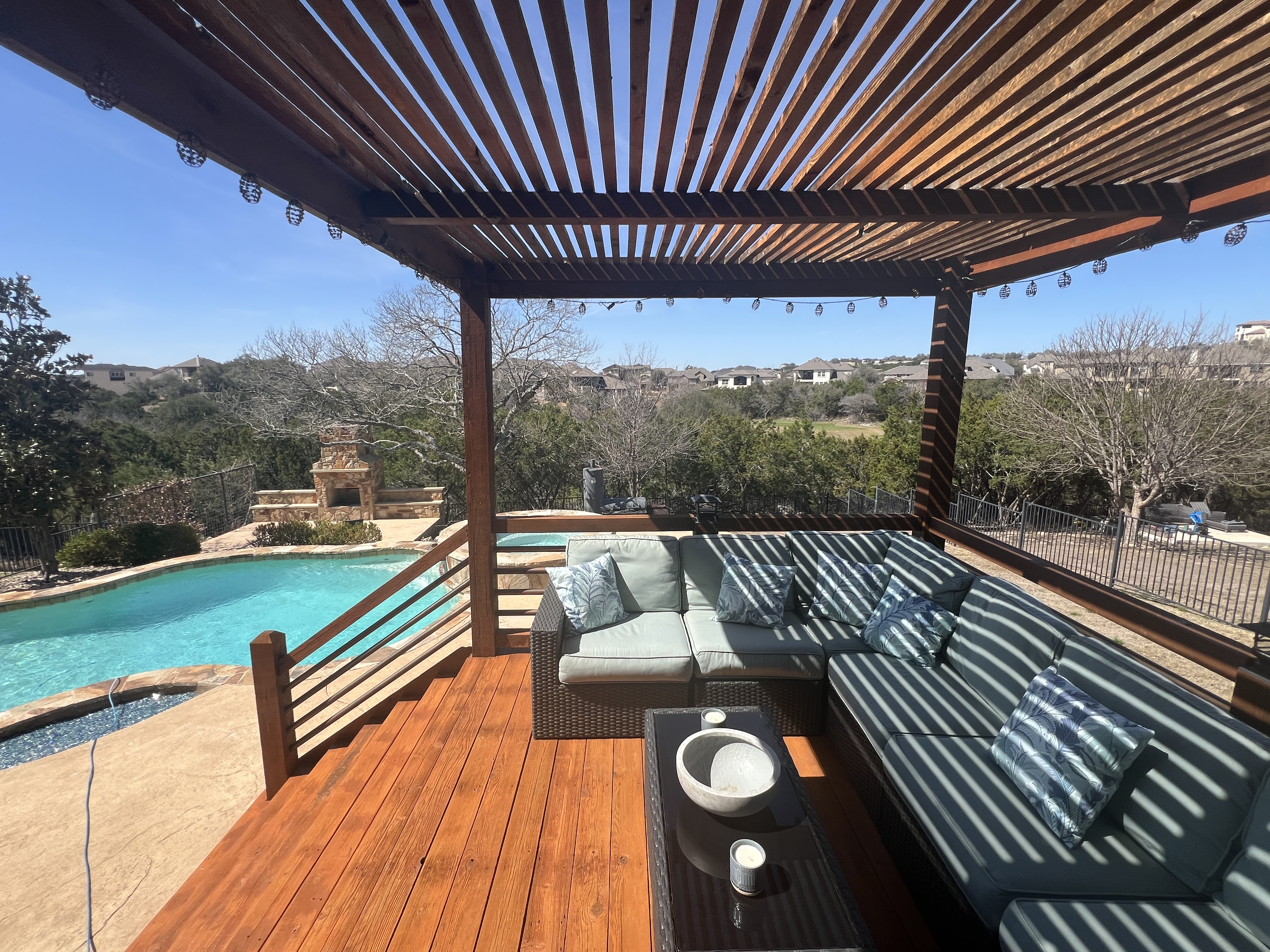 Heated in-ground pool and spa with covered patio