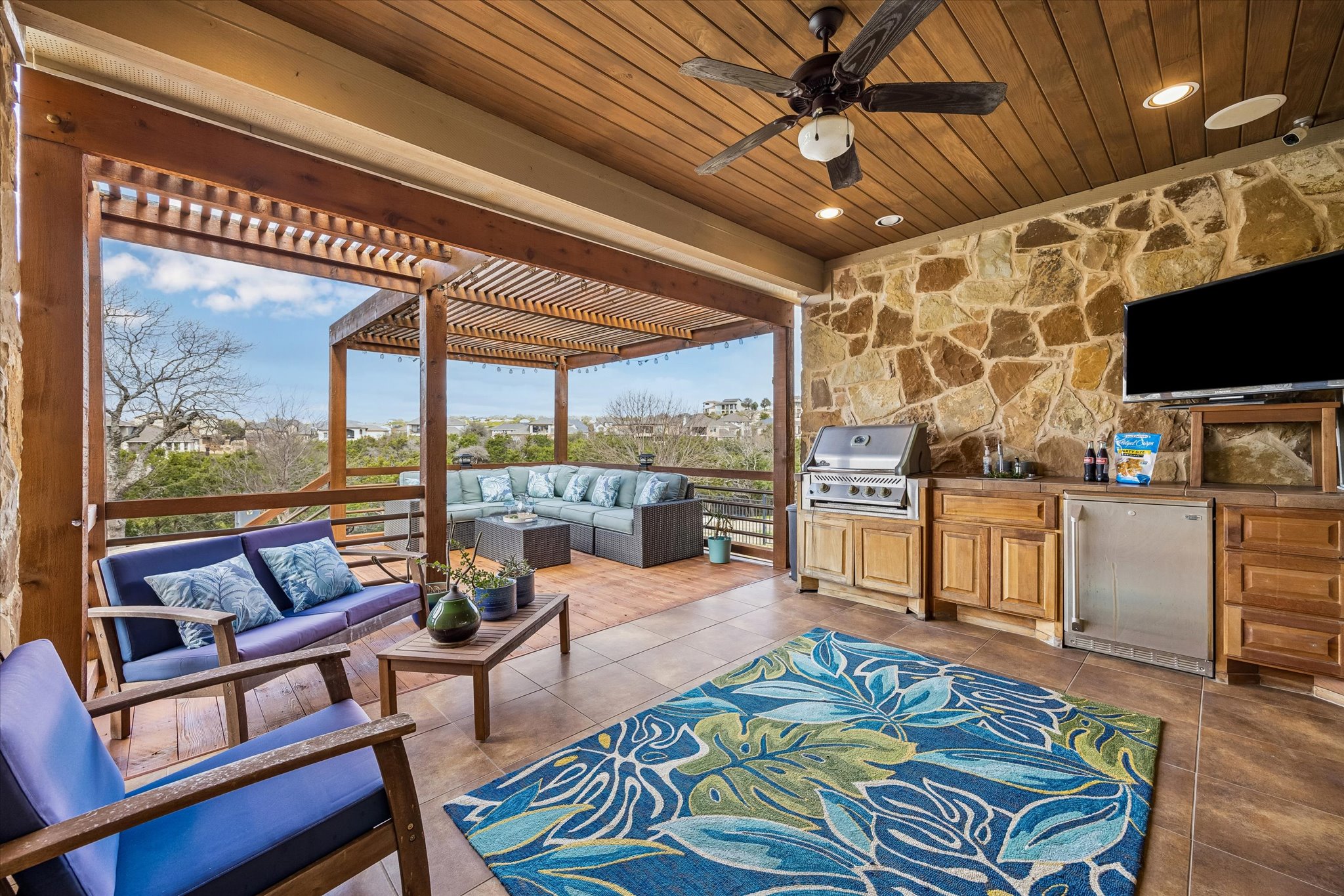 Backyard pool and outdoor living area at sunset