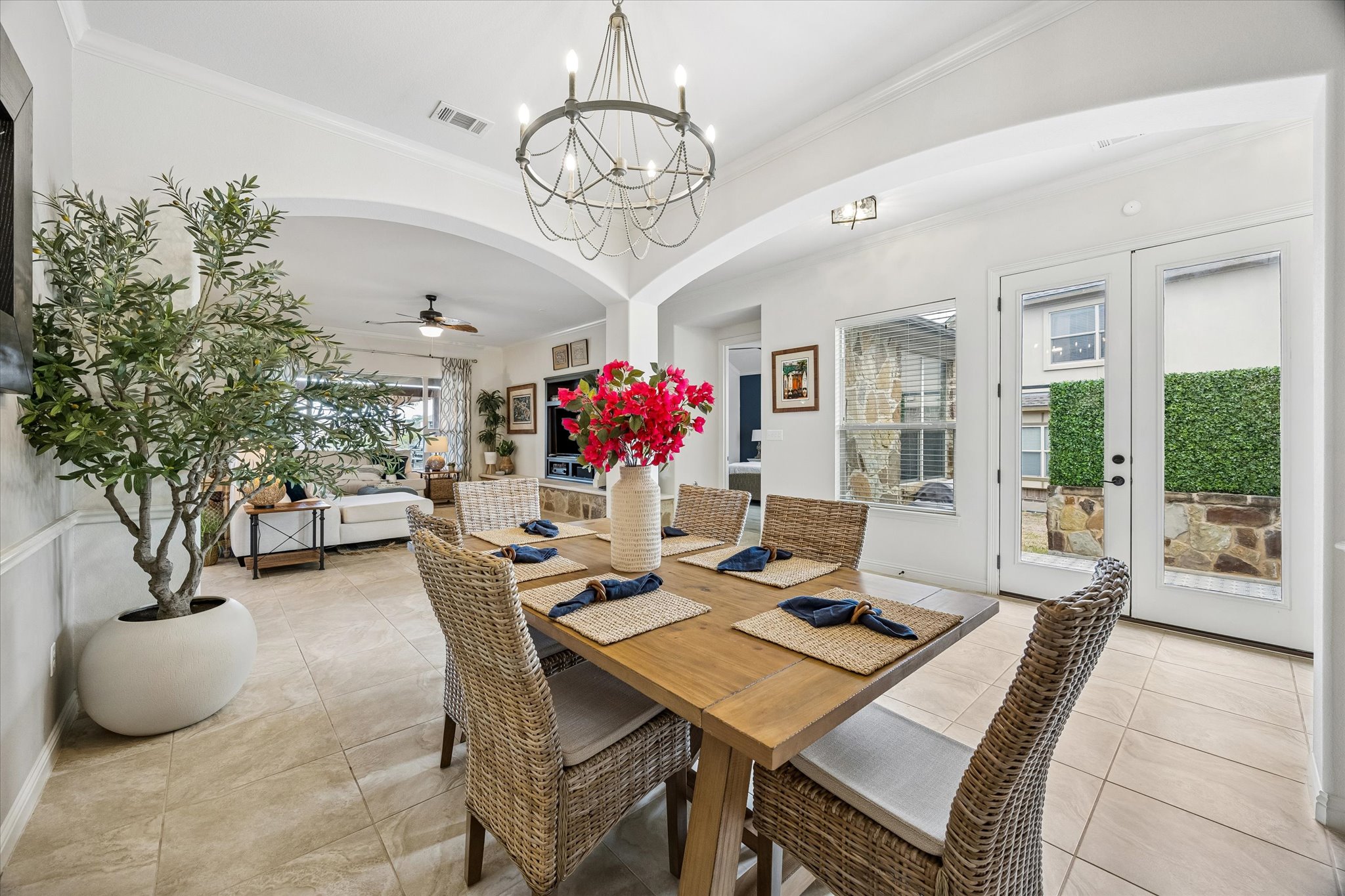 Formal dining area with designer lighting