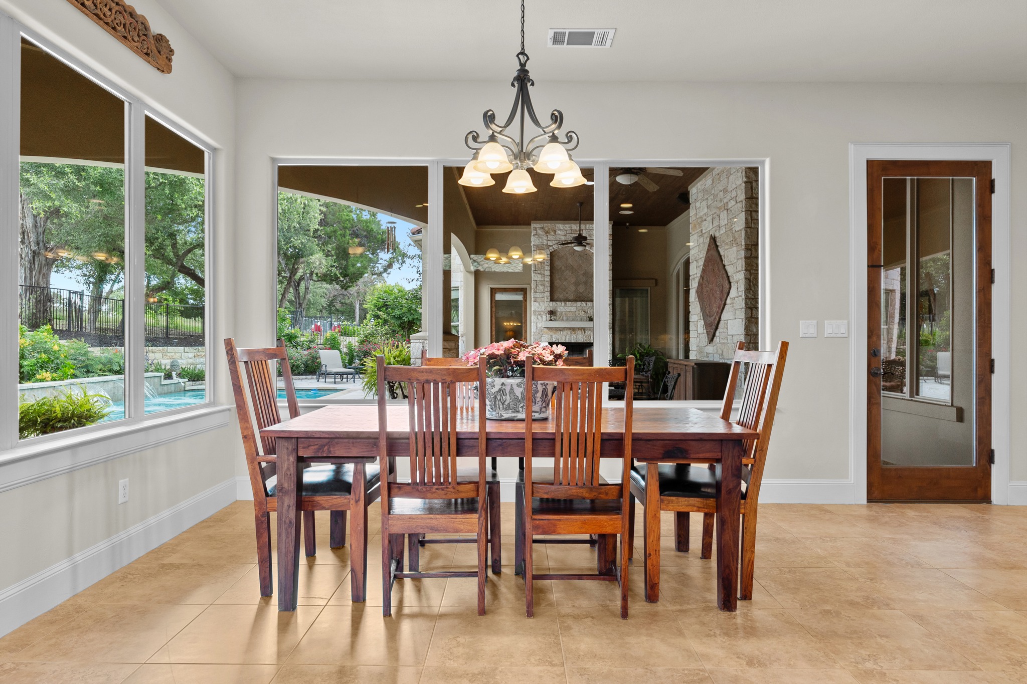 Main-floor primary suite with tray ceilings
