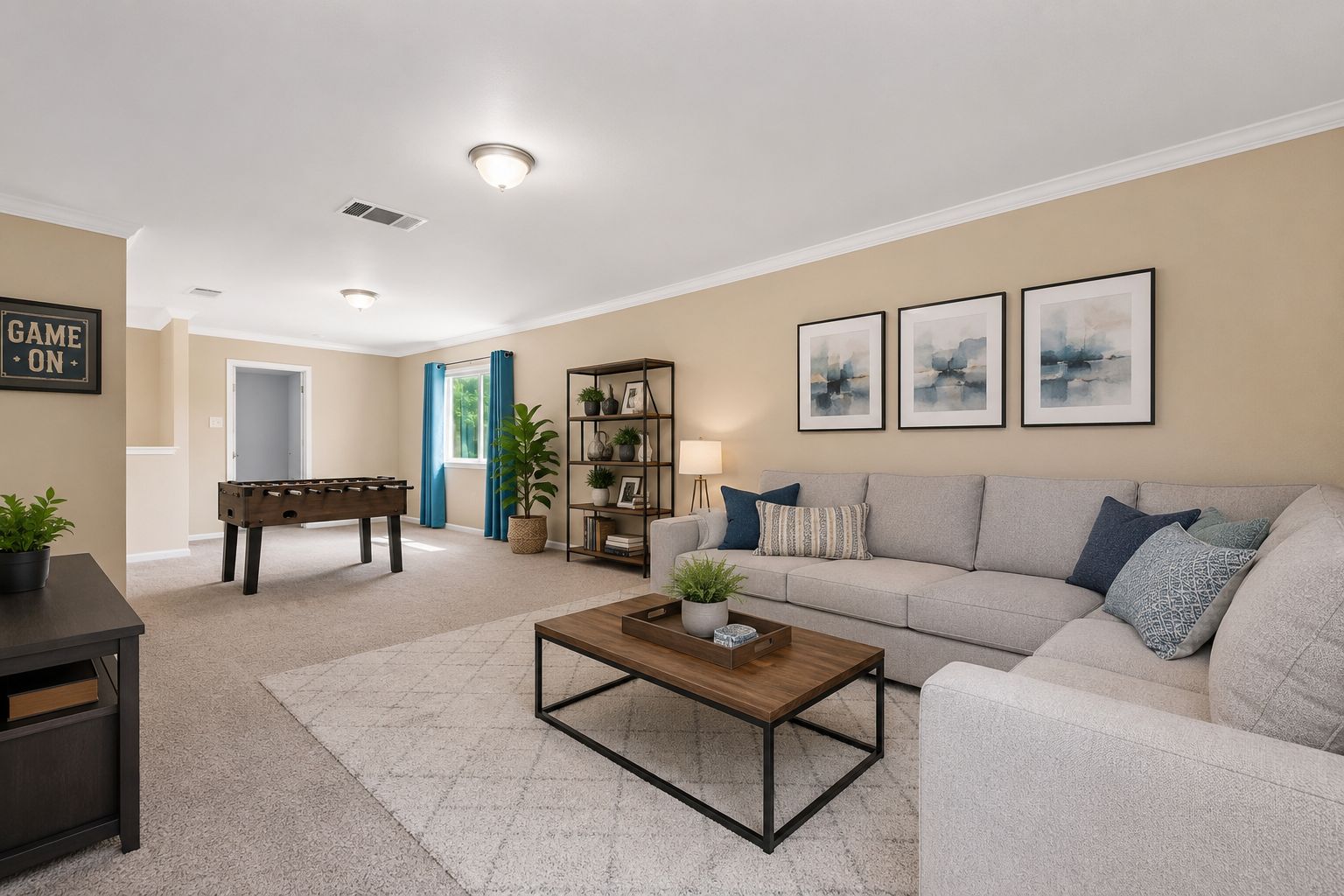 Upstairs bonus loft virtually staged as a game / media room with sectional and foosball