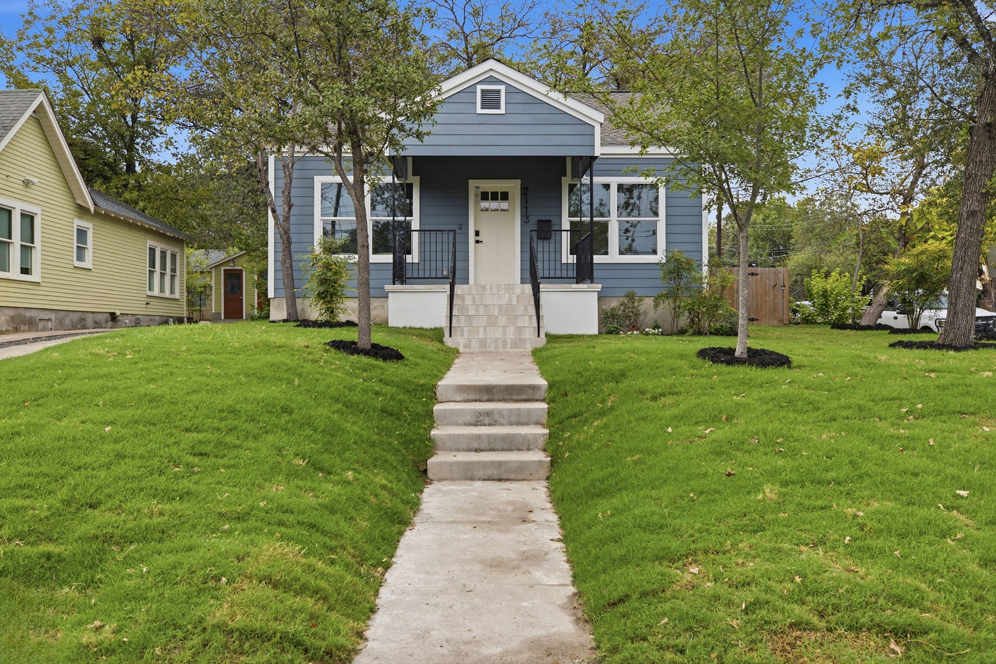 Front walk leading up to the covered porch
