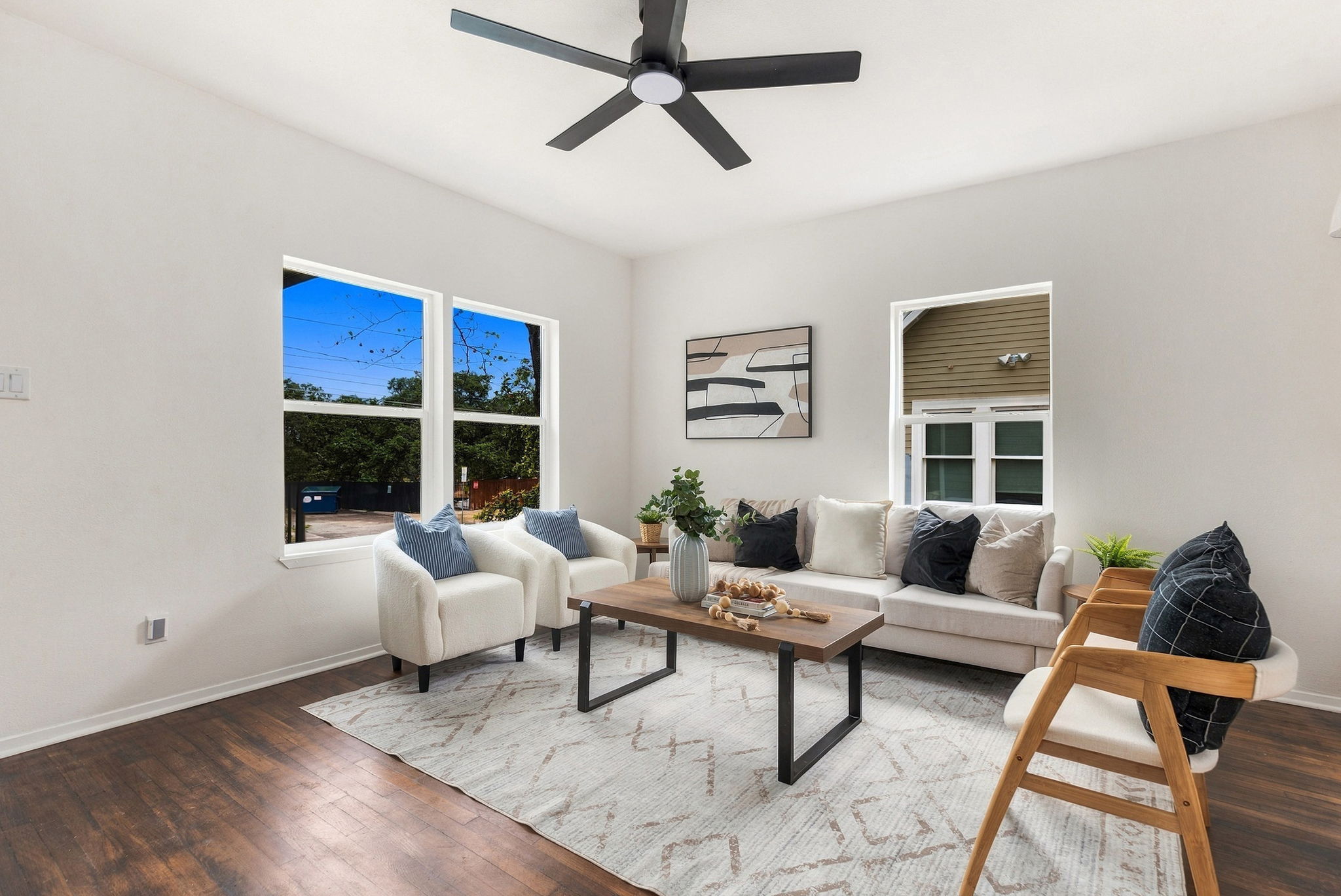 Living room with windows on two walls