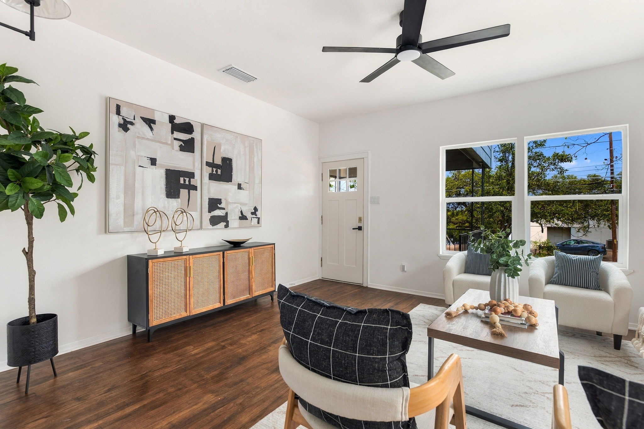 Living room seating area by the front windows