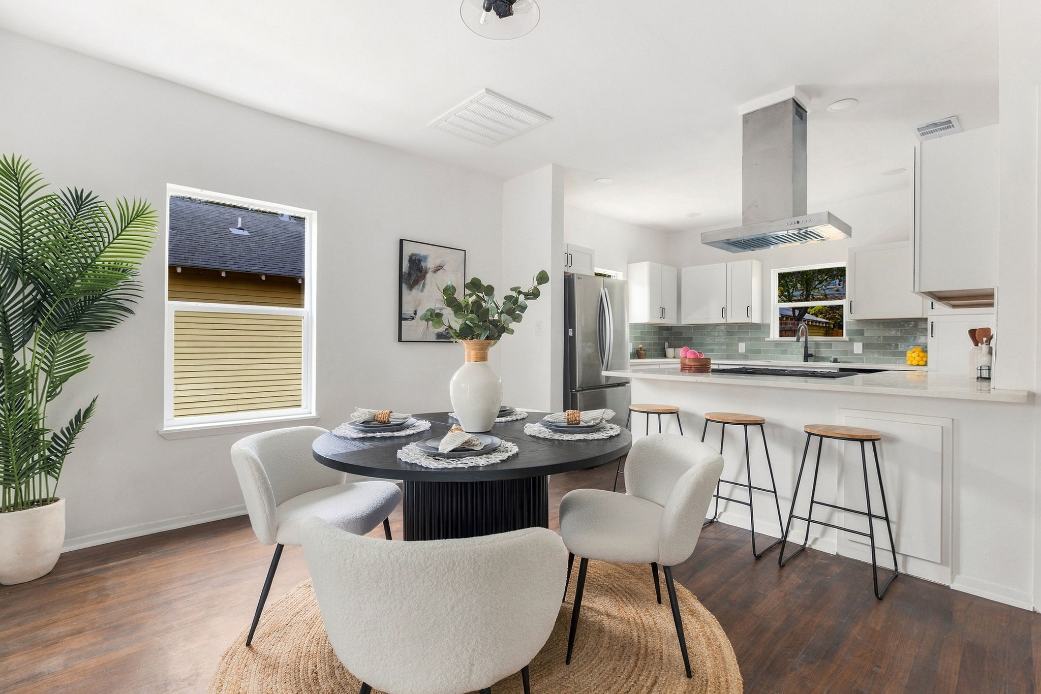 Dining area open to the kitchen and breakfast bar