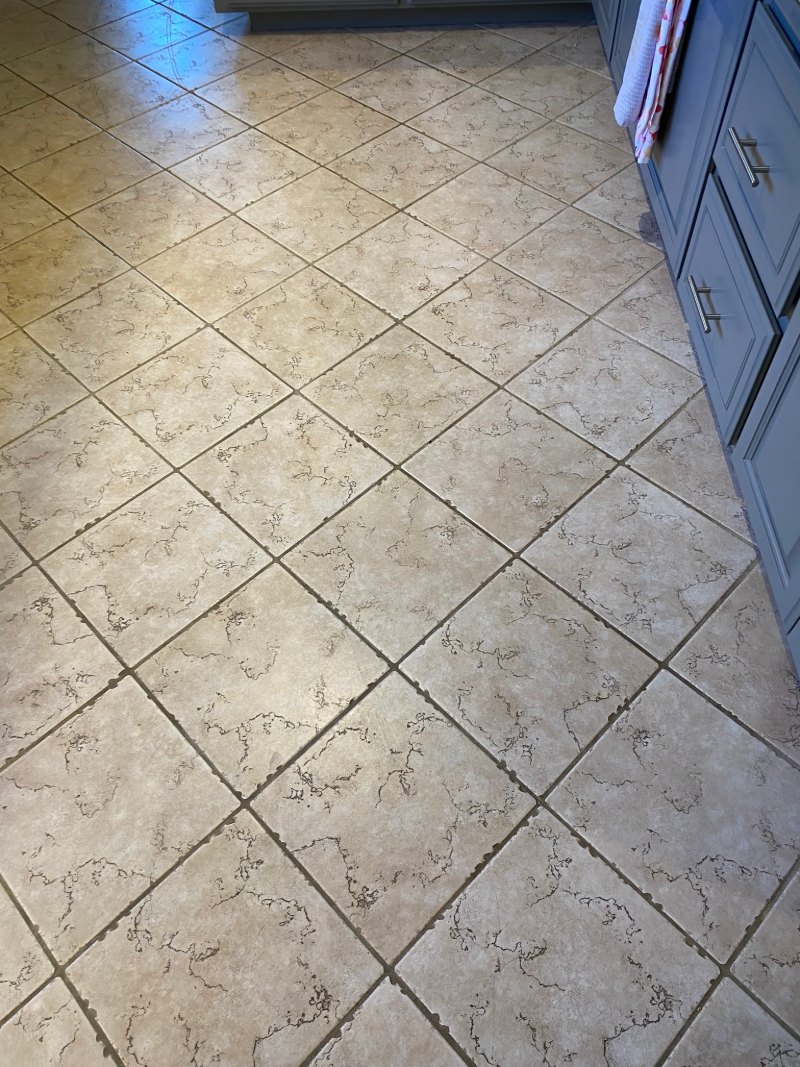 Kitchen diagonal tile and grout before professional cleaning in South Bay CA