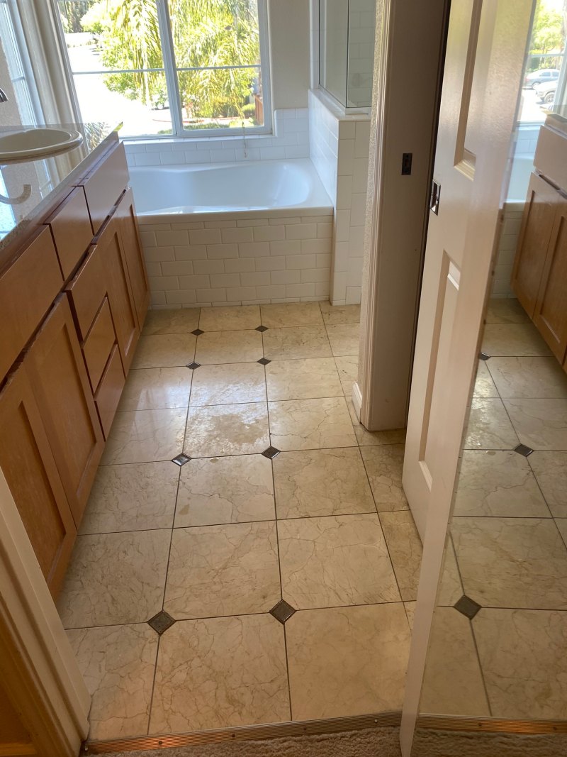 Master bathroom marble floor before professional restoration in San Jose CA