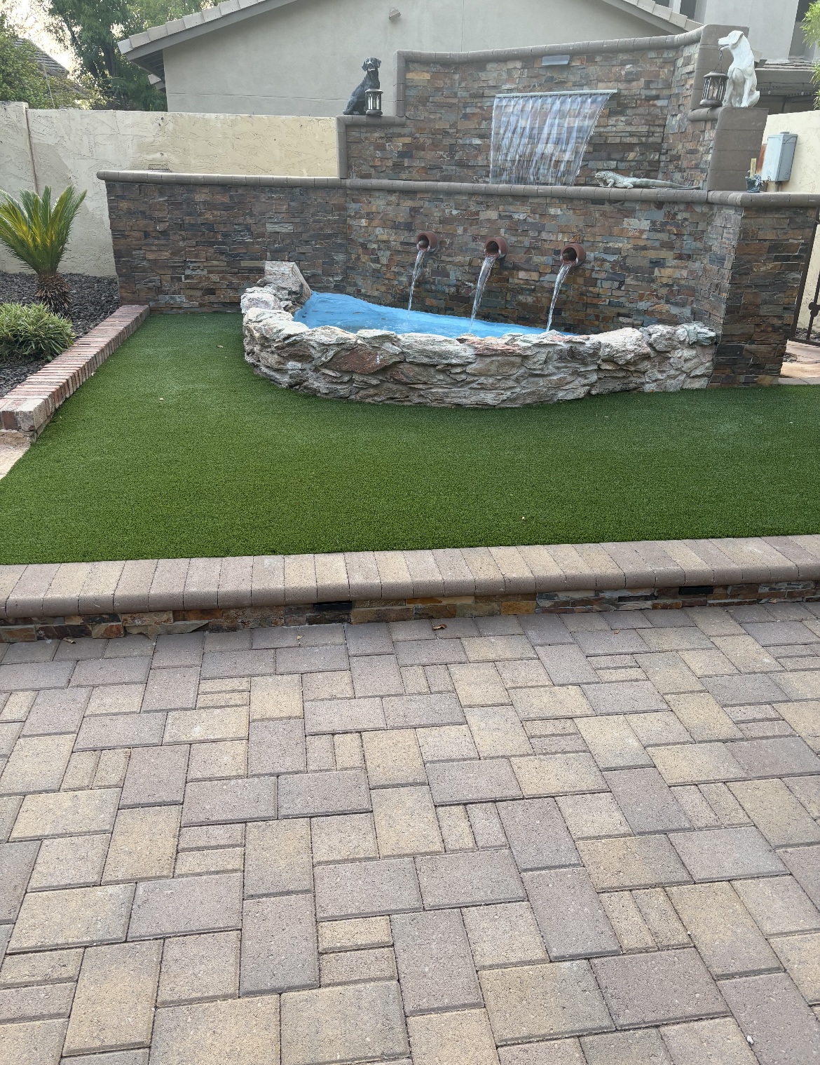 Custom stone spillway pool East Valley