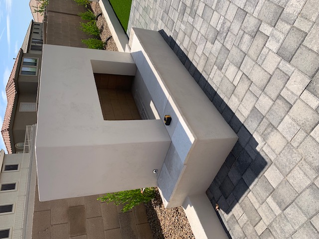 Custom linear fire feature stone surround Scottsdale