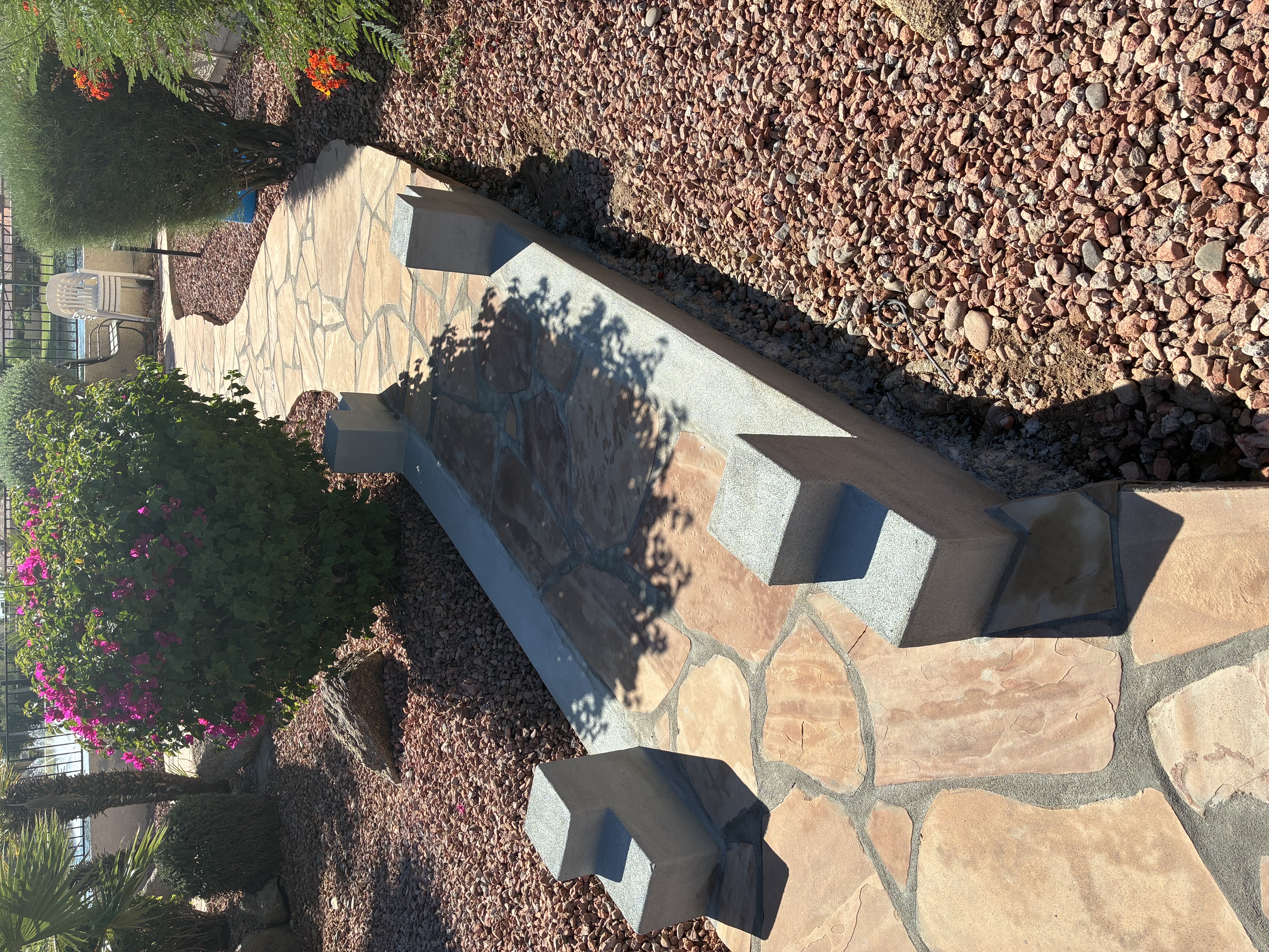 Raised stone planter with paver border Tempe