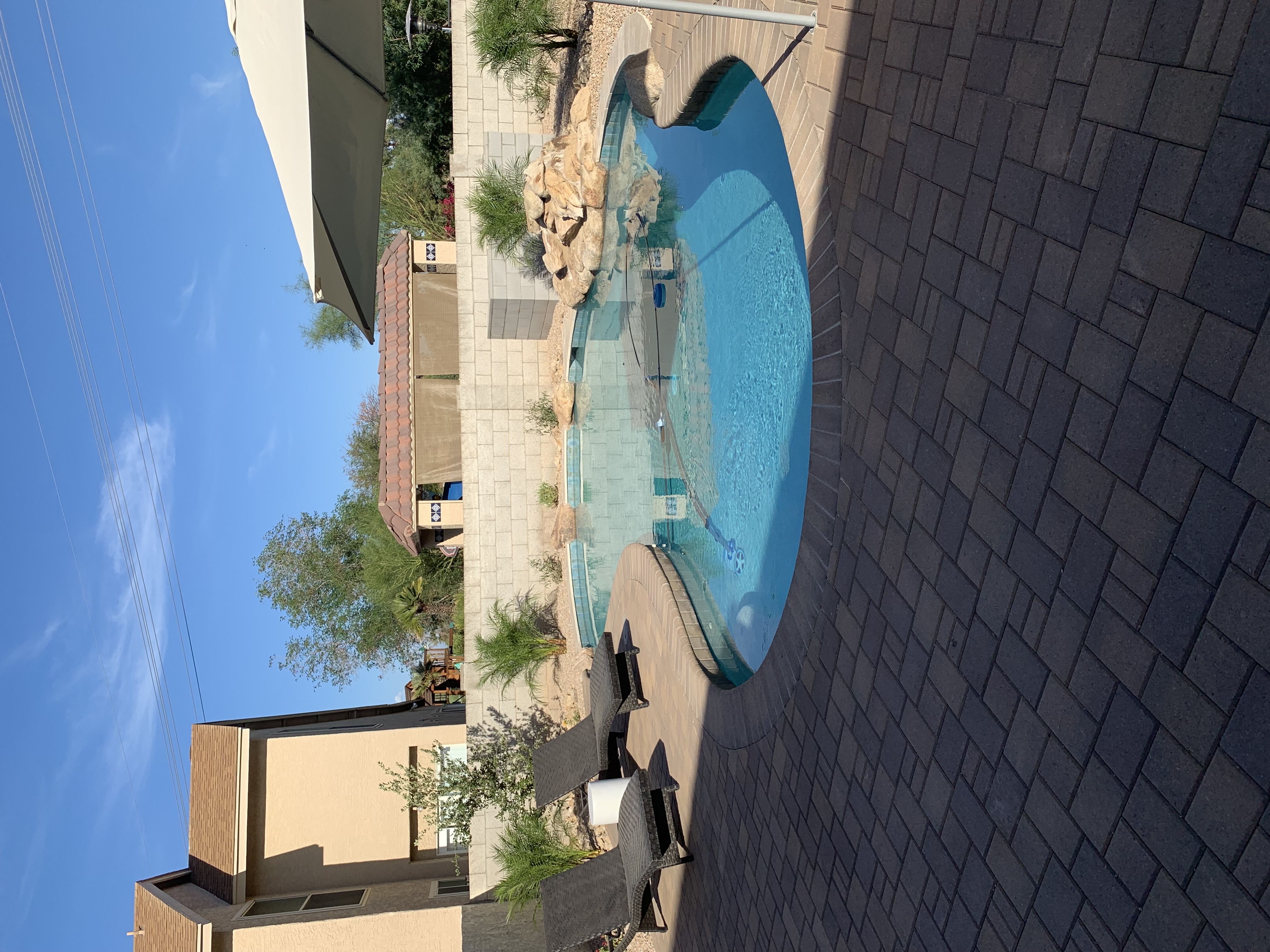 Pool with custom stone coping Scottsdale