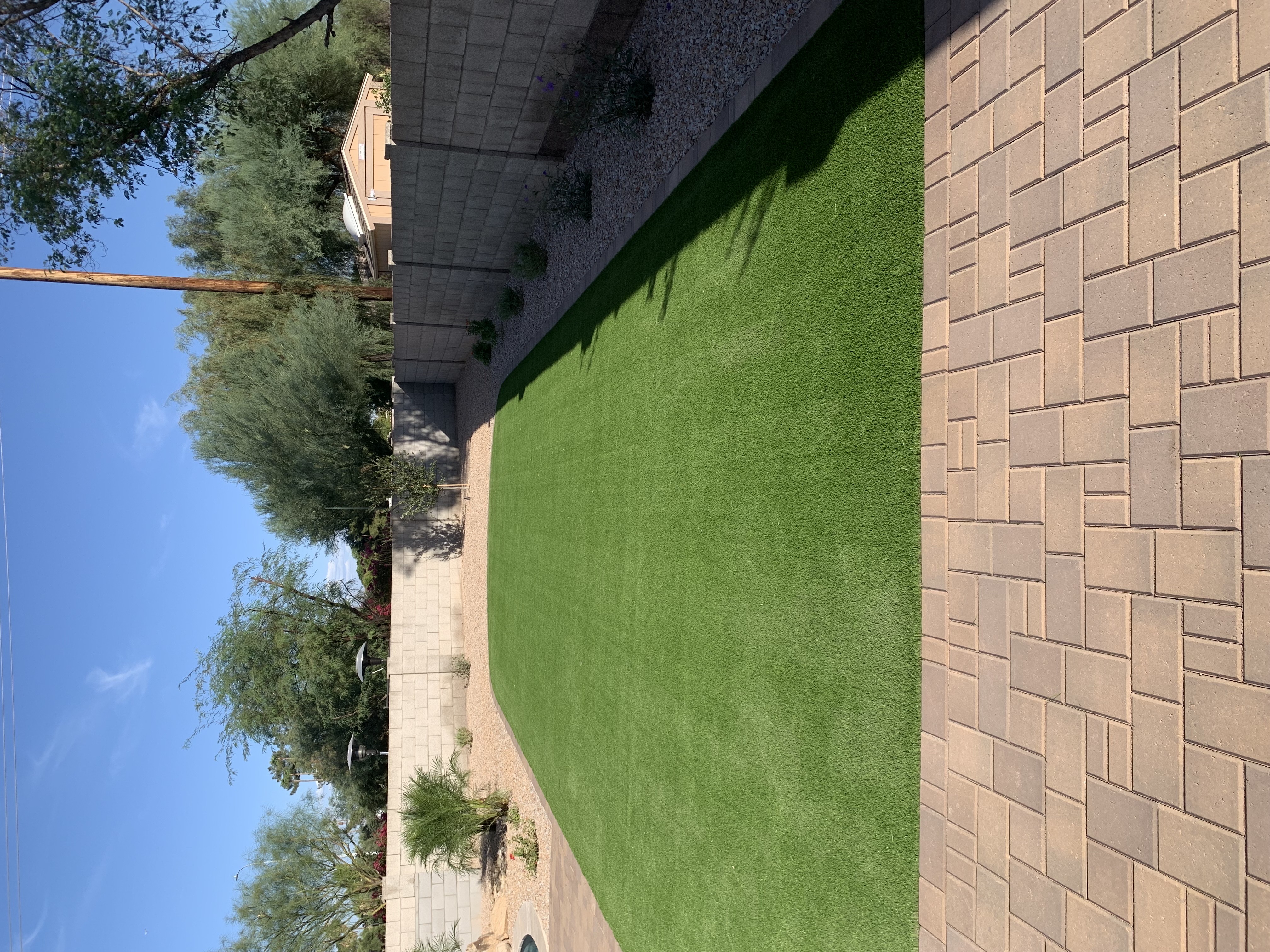 Stone border front yard turf Scottsdale