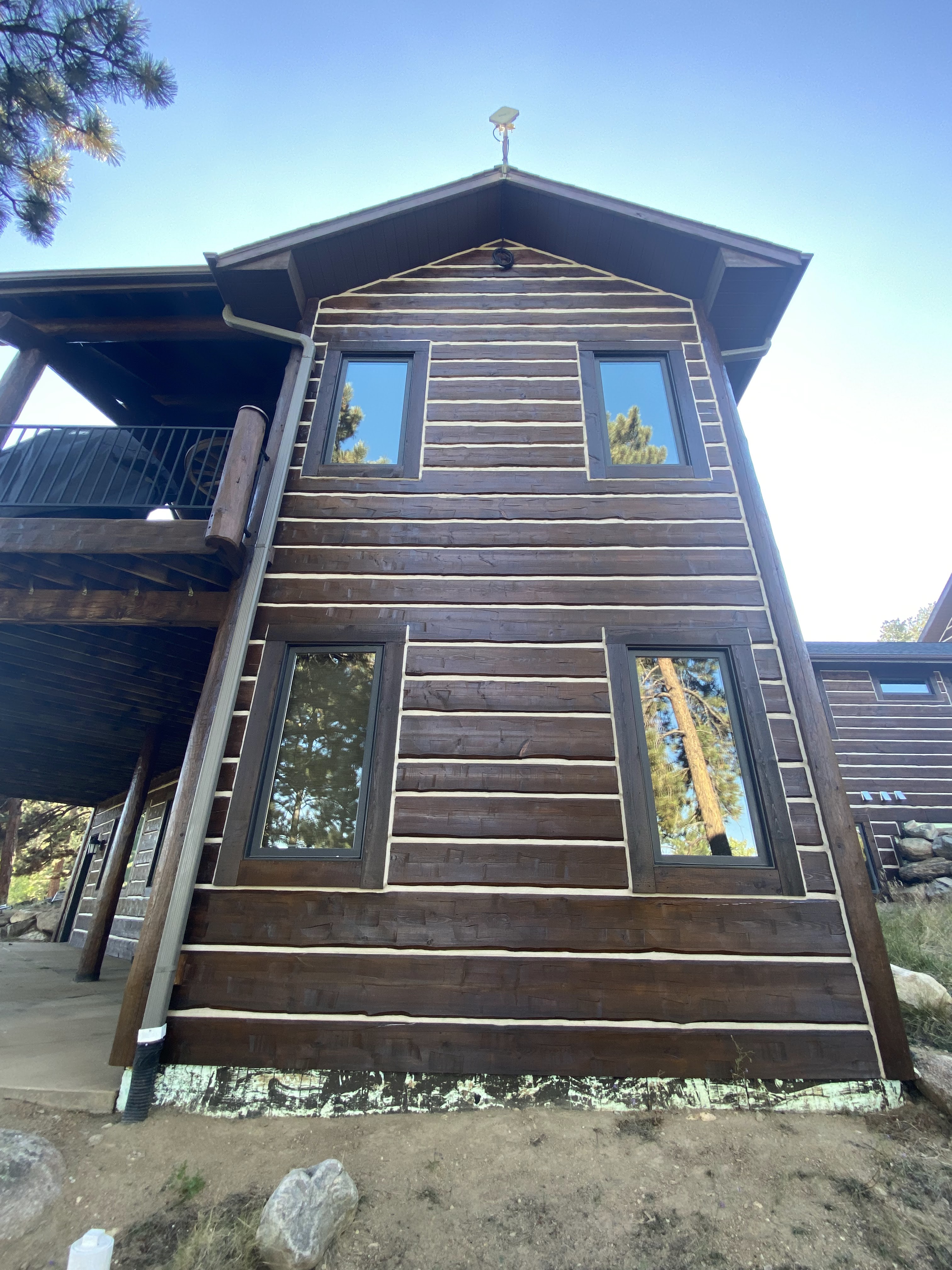 Log Home Chinking project by Mountain Man Painting in Colorado