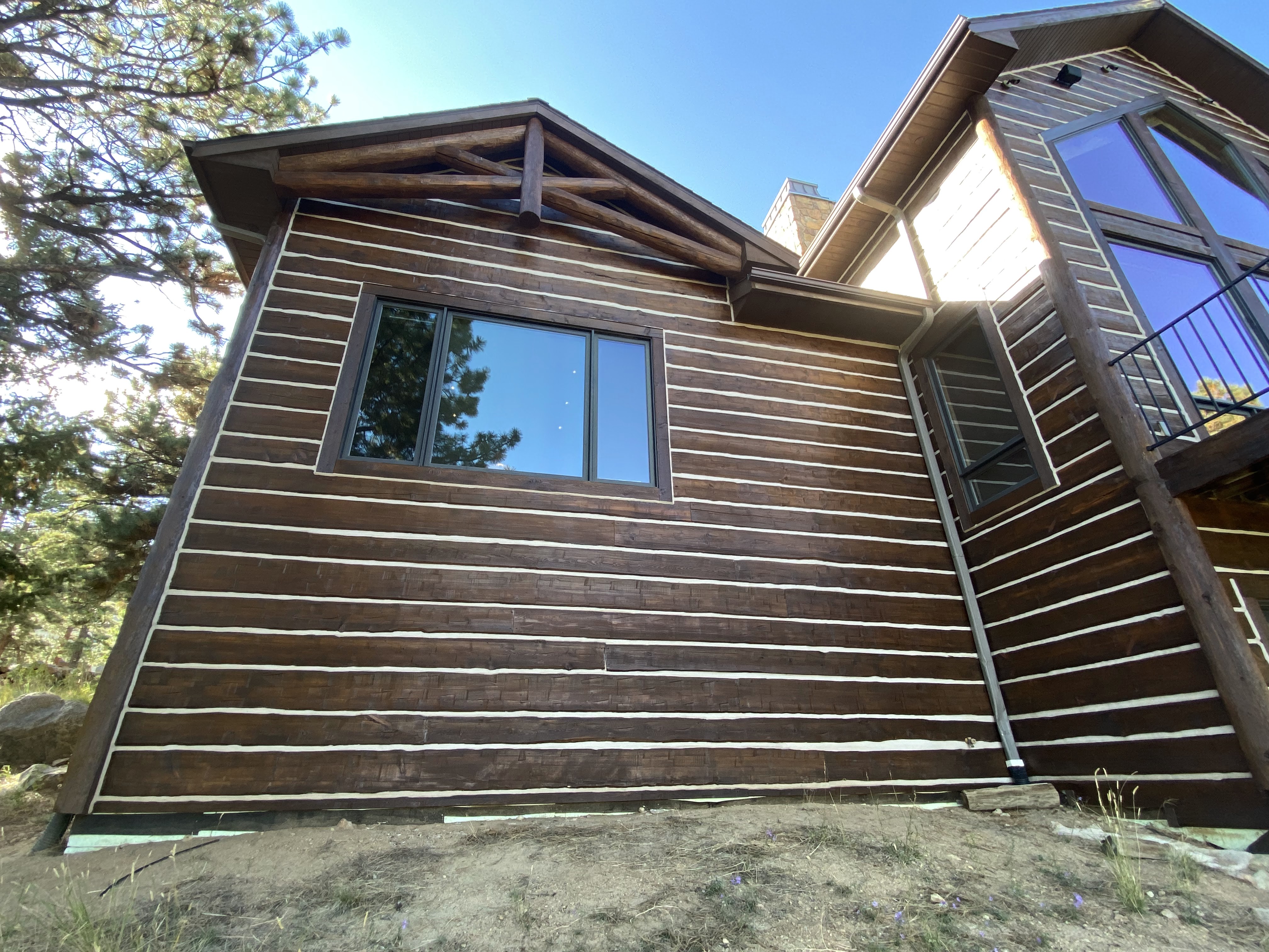 Log Home Chinking project by Mountain Man Painting in Colorado
