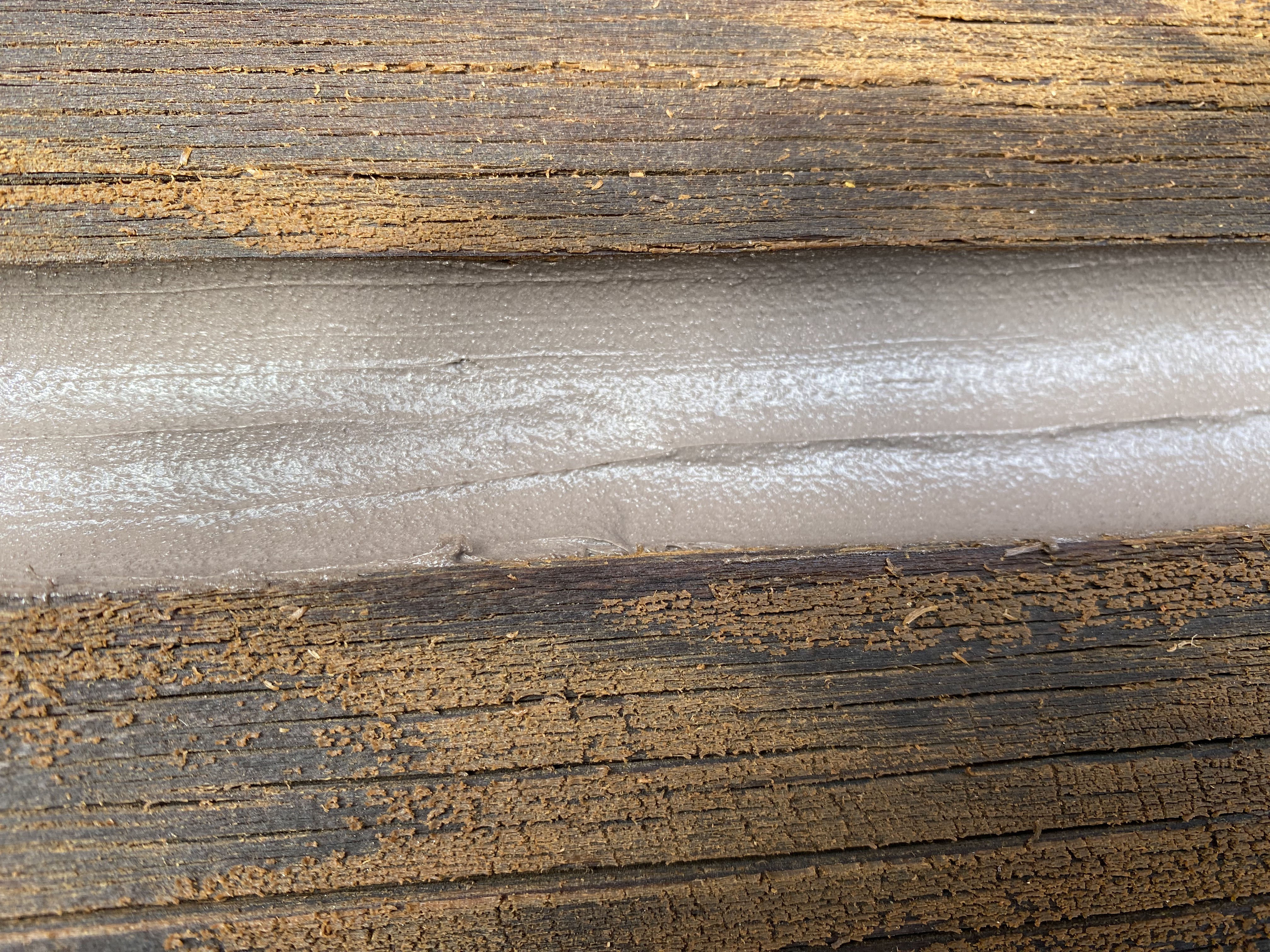 Log Home Chinking project by Mountain Man Painting in Colorado