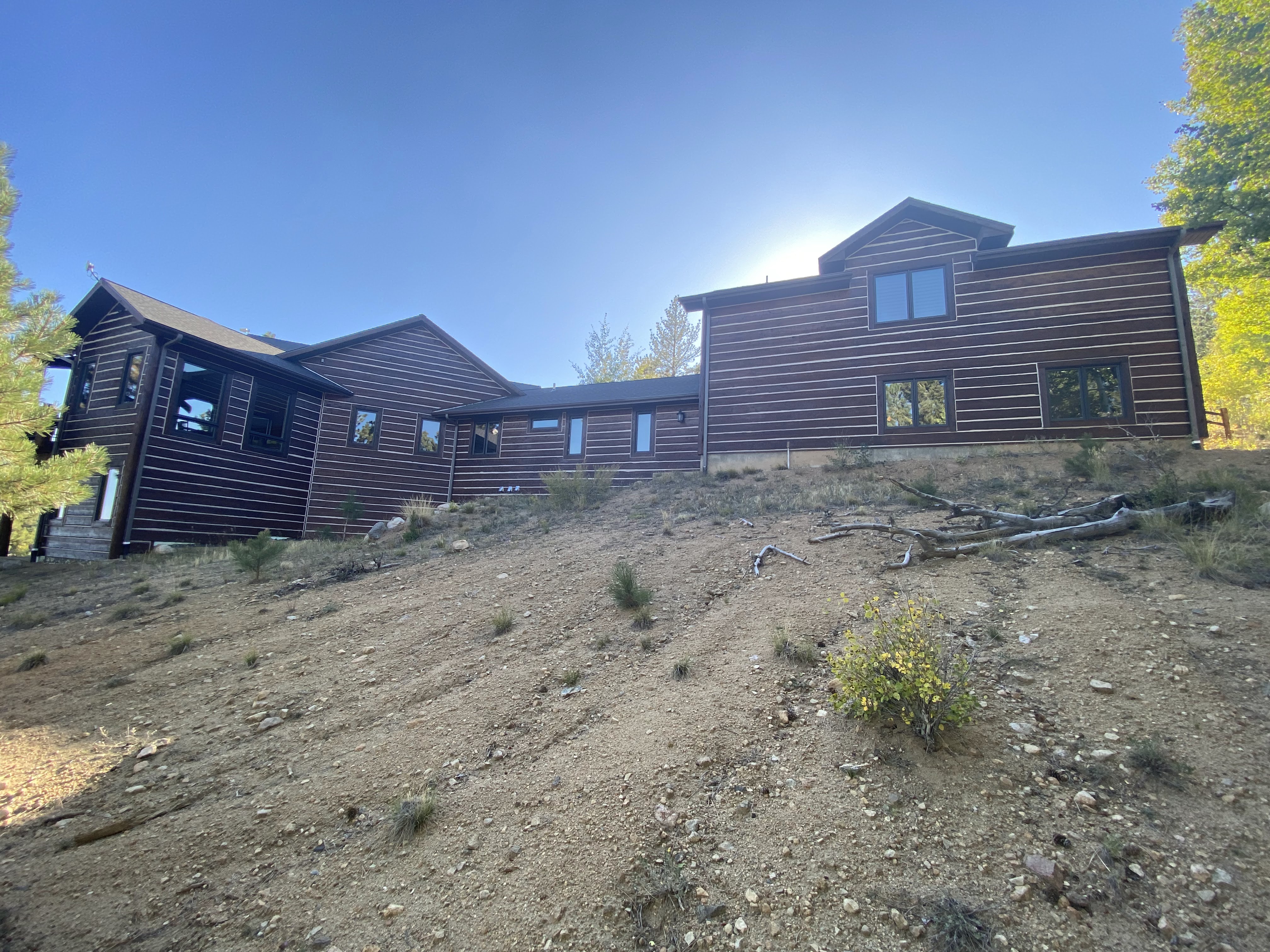 Log Home Staining & Restoration project by Mountain Man Painting in Colorado