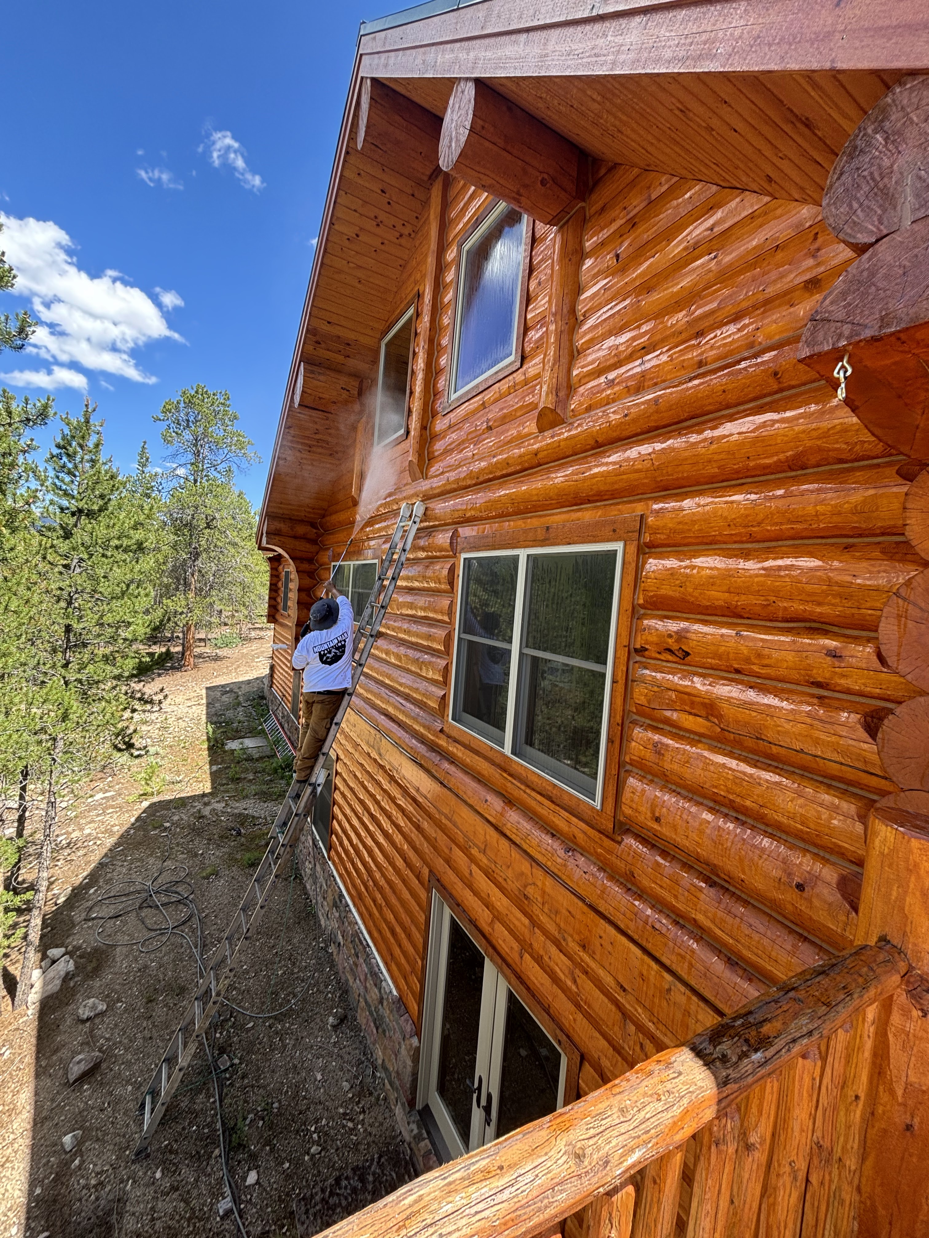 Log Home Staining & Restoration project by Mountain Man Painting in Colorado