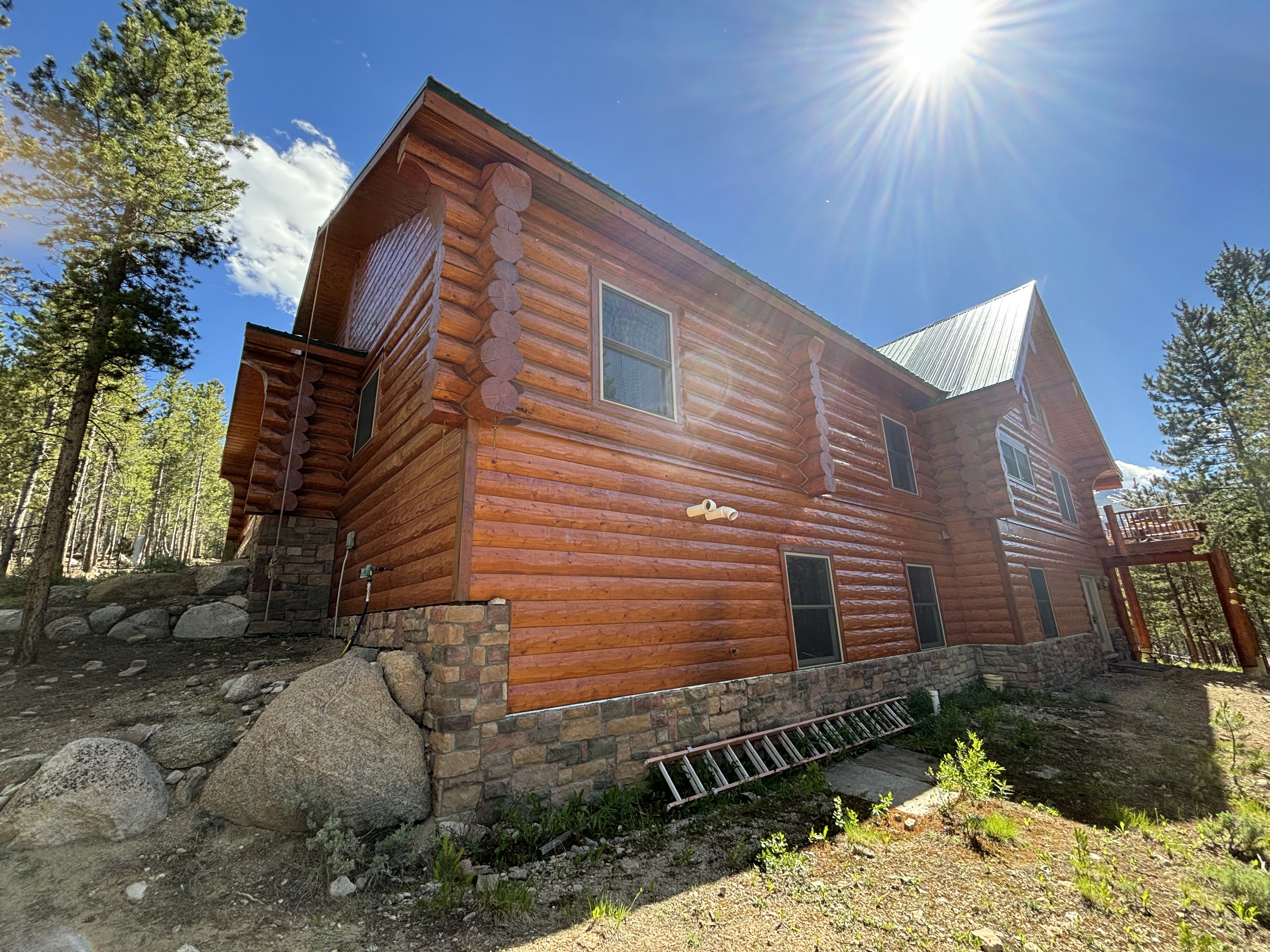 Log Home Staining & Restoration project by Mountain Man Painting in Colorado