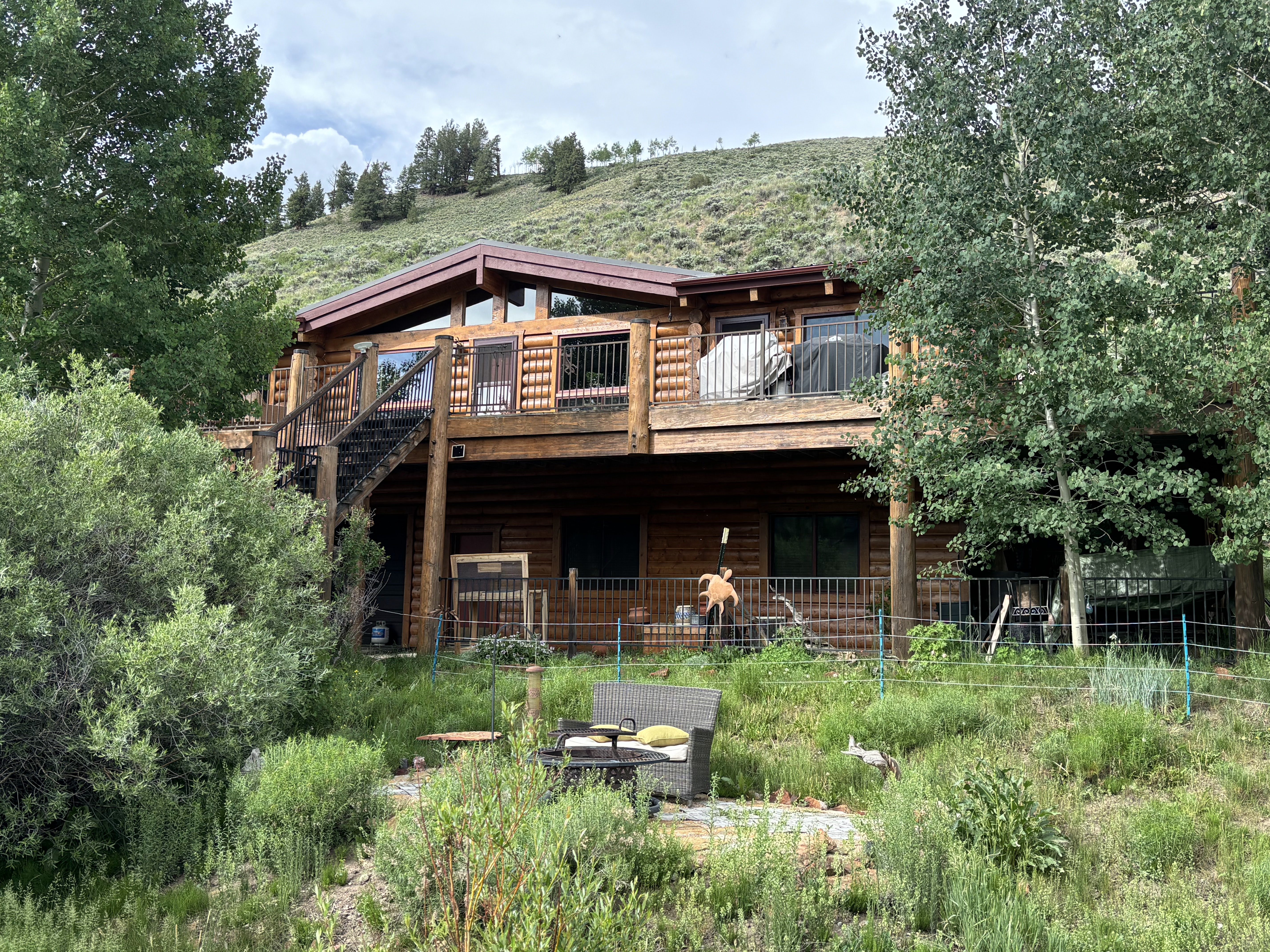 Log Home Staining & Restoration project by Mountain Man Painting in Colorado