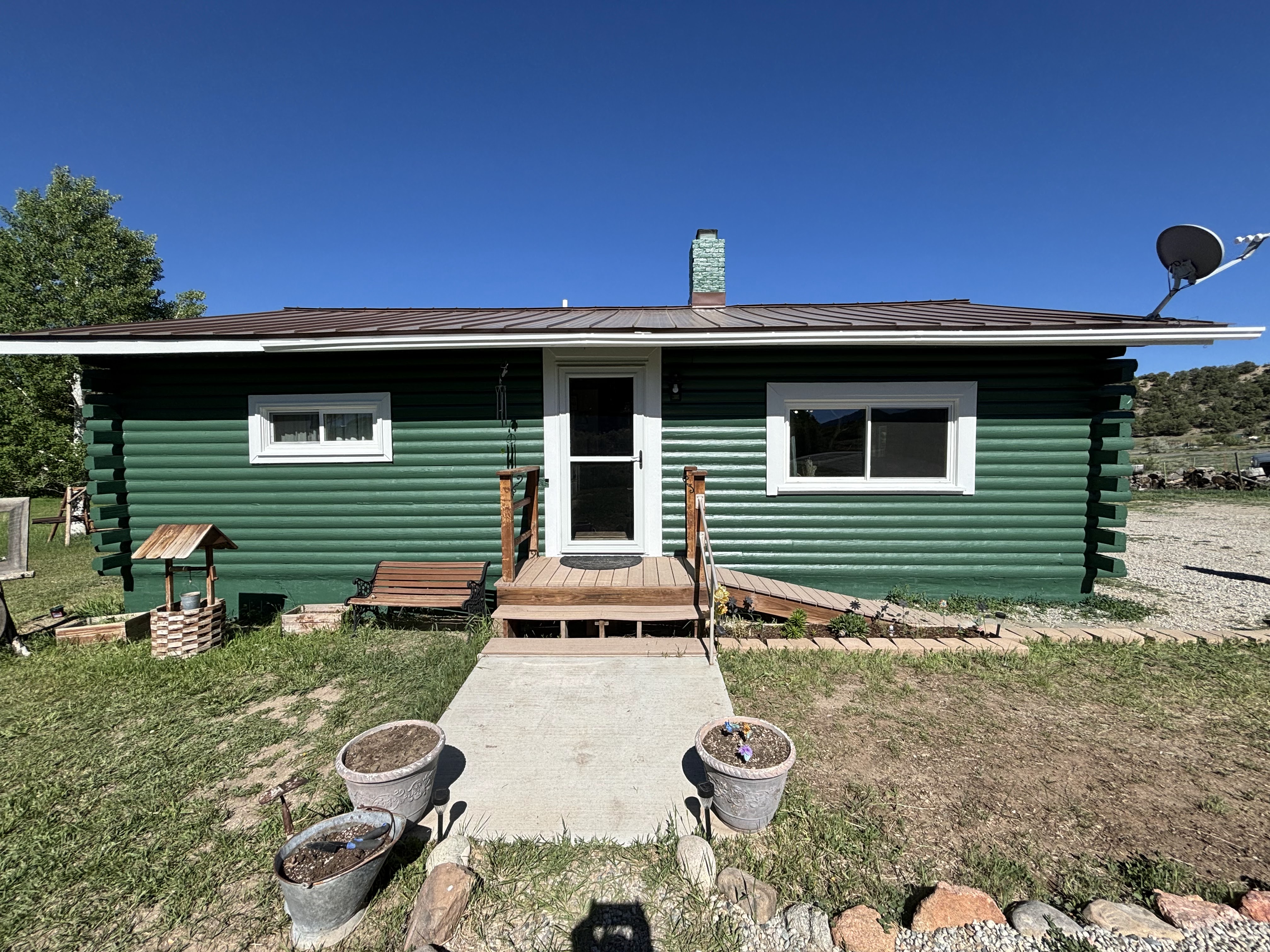 Log Home Staining & Restoration project by Mountain Man Painting in Colorado
