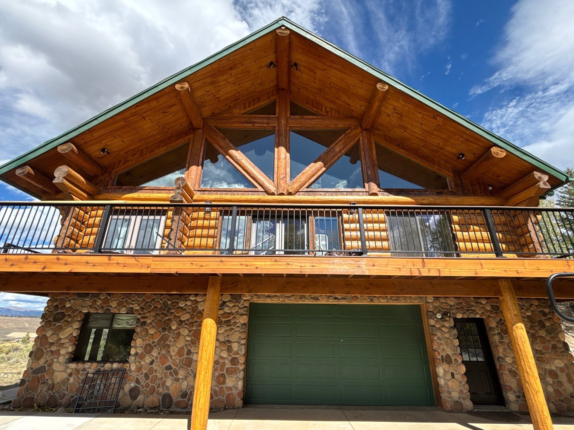 Log Home Staining & Restoration project by Mountain Man Painting in Colorado