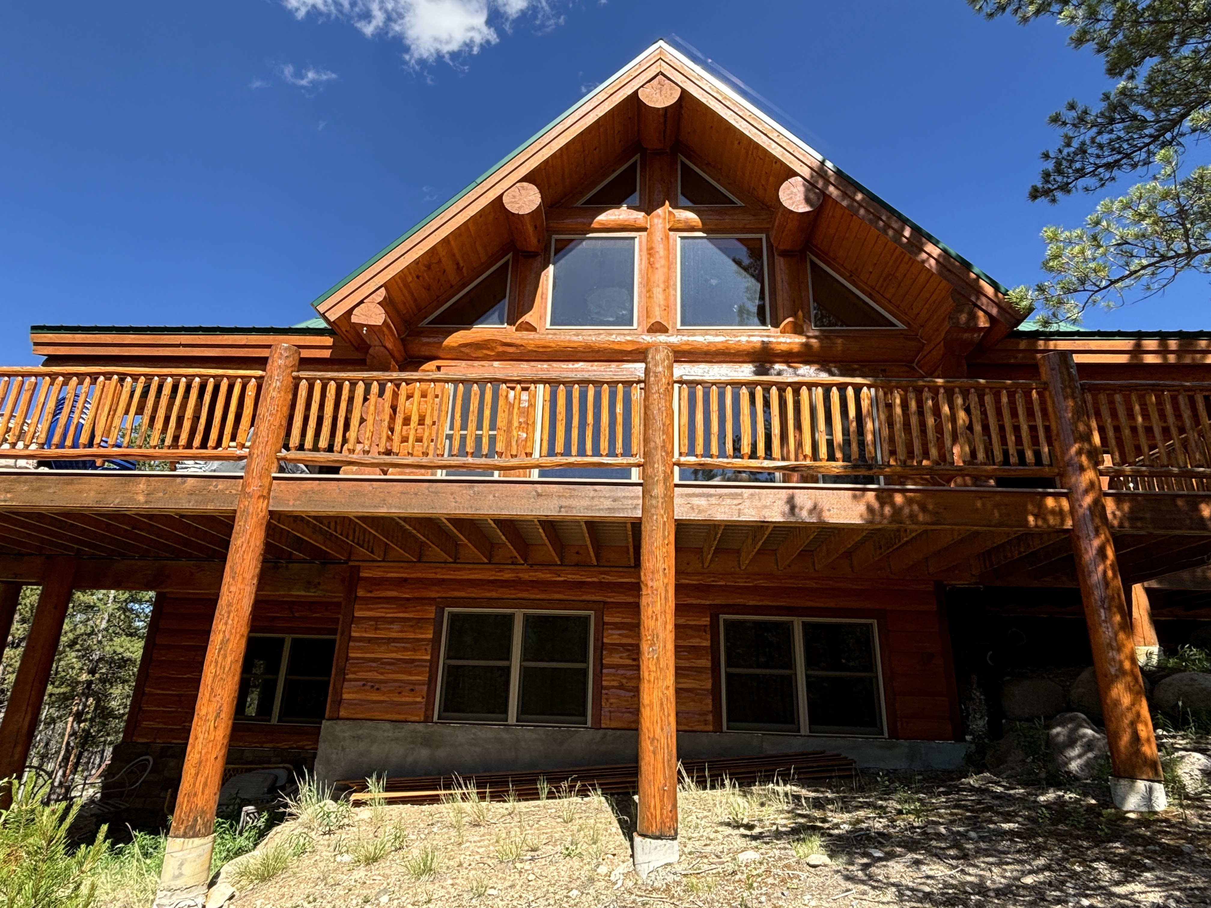 Log Home Staining & Restoration project by Mountain Man Painting in Colorado