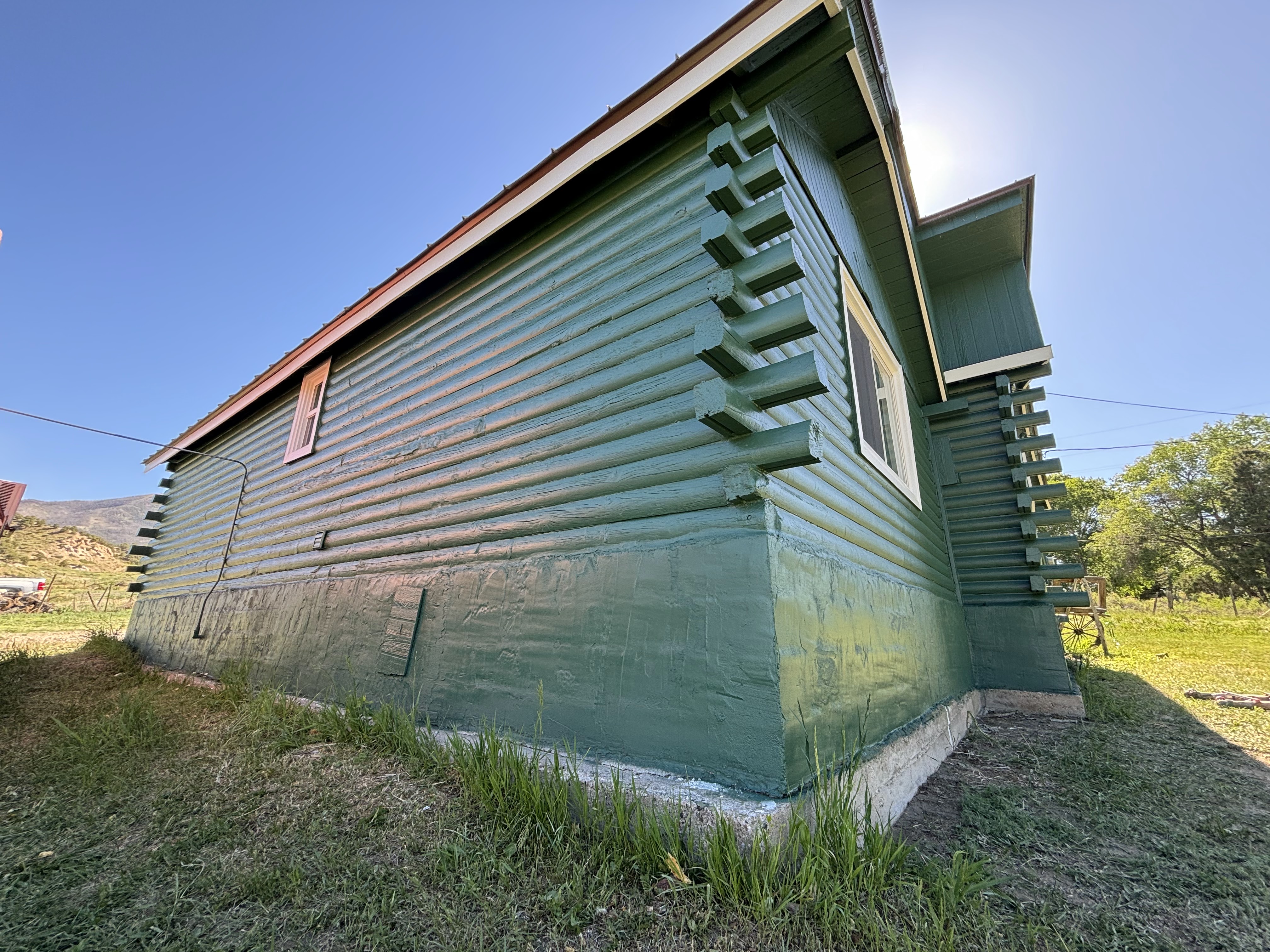 Log Home Staining & Restoration project by Mountain Man Painting in Colorado