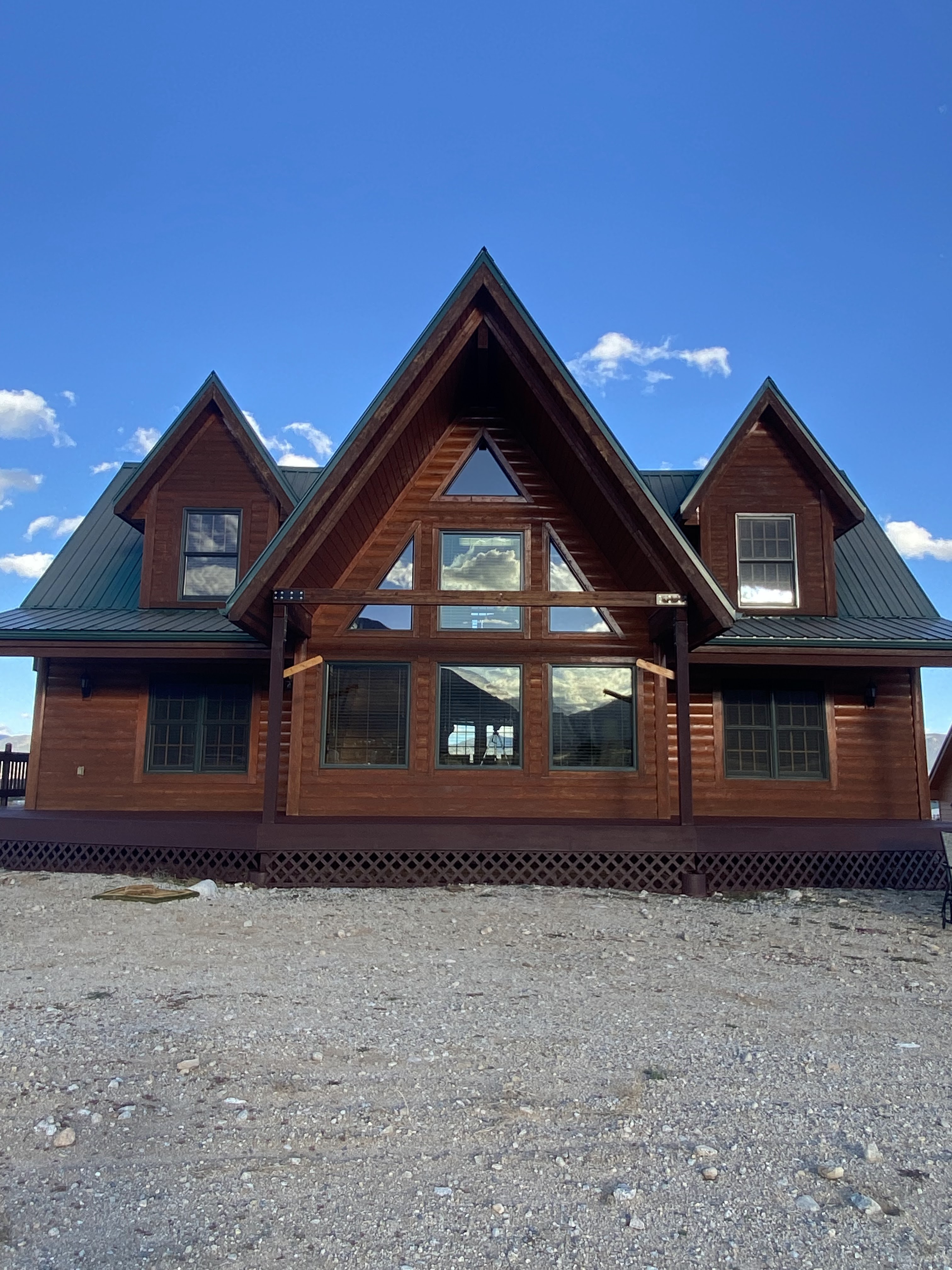 Log Home Staining & Restoration project by Mountain Man Painting in Colorado