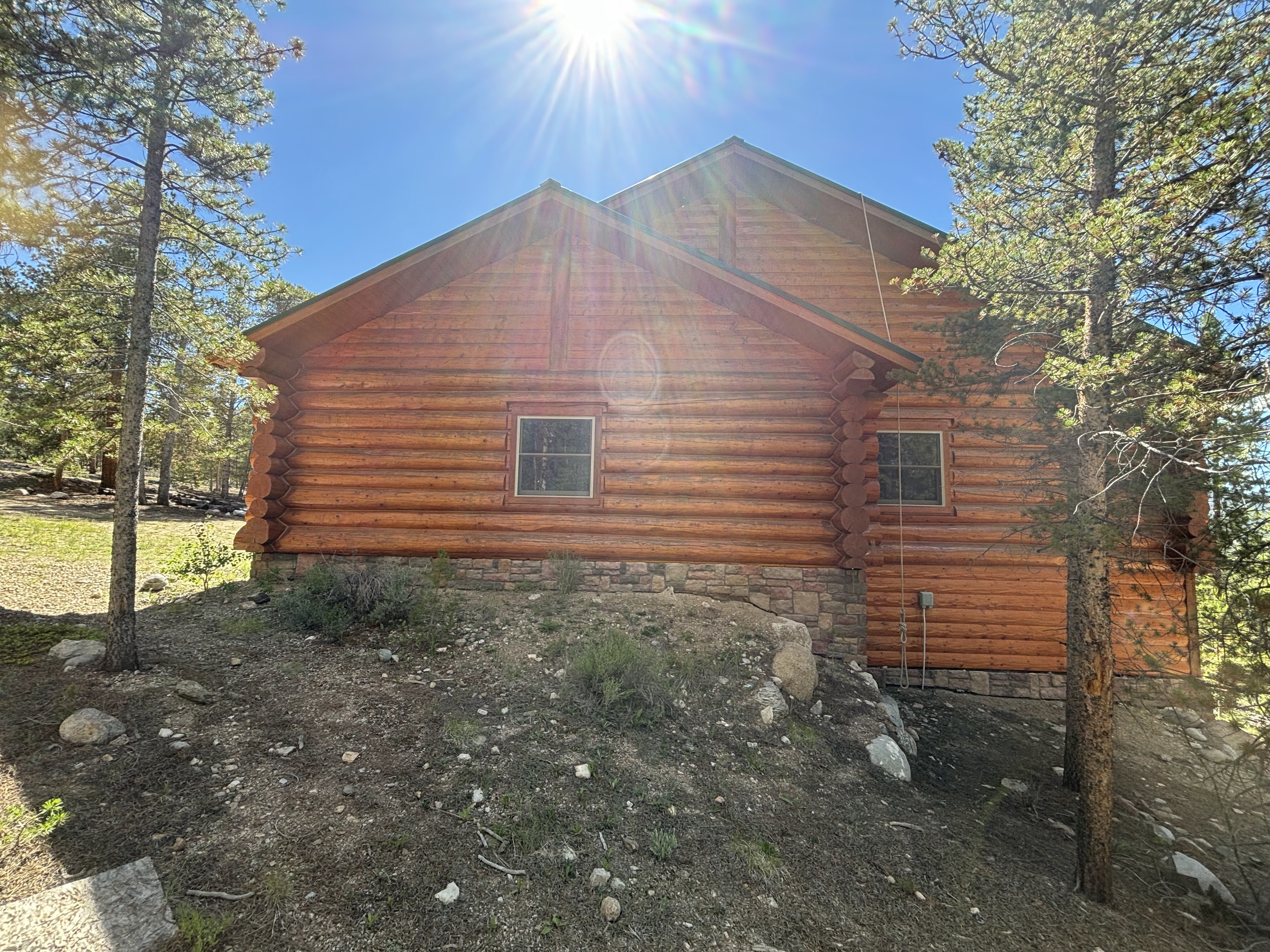 Log Home Staining & Restoration project by Mountain Man Painting in Colorado