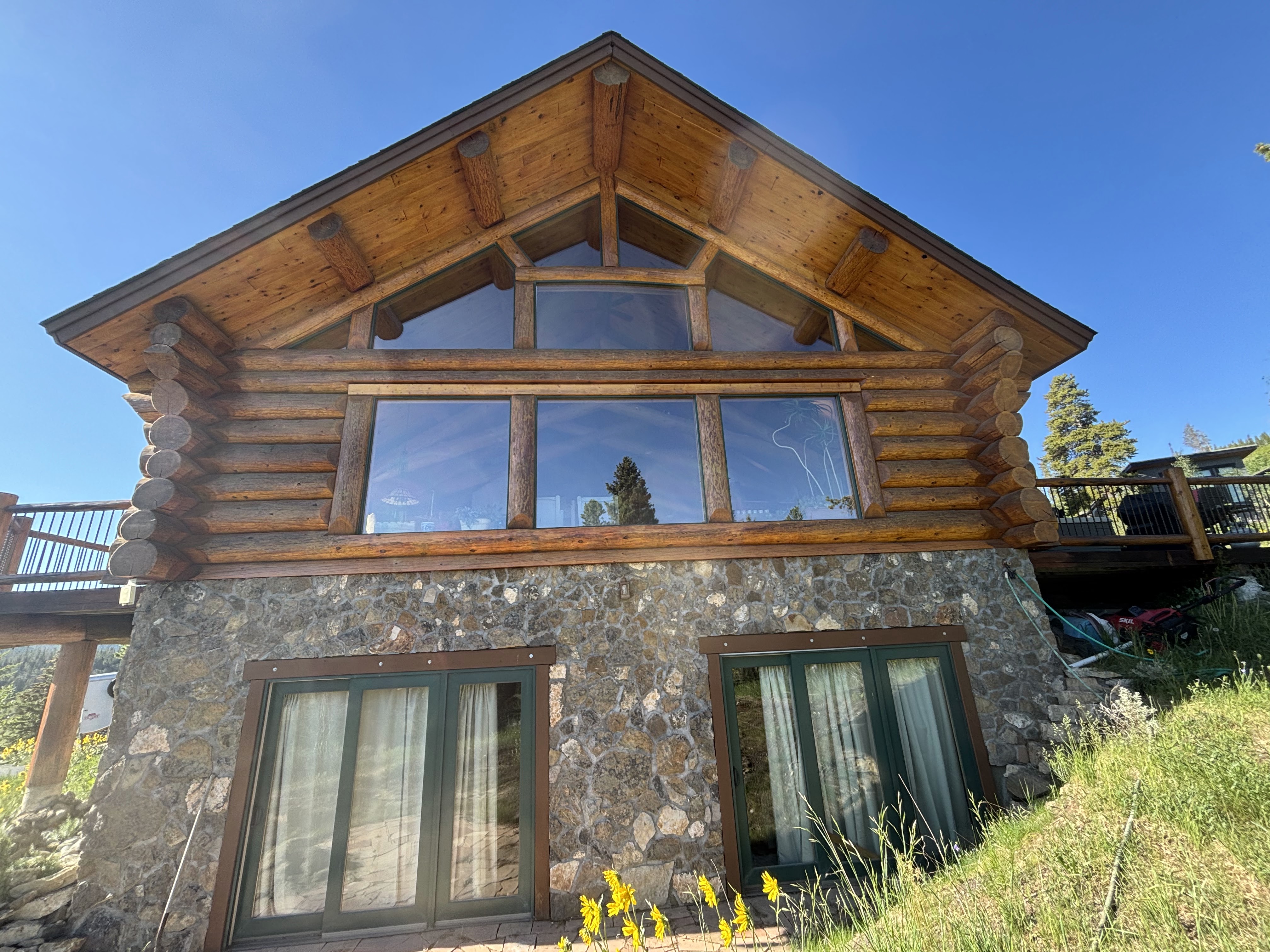 Log Home Staining & Restoration project by Mountain Man Painting in Colorado