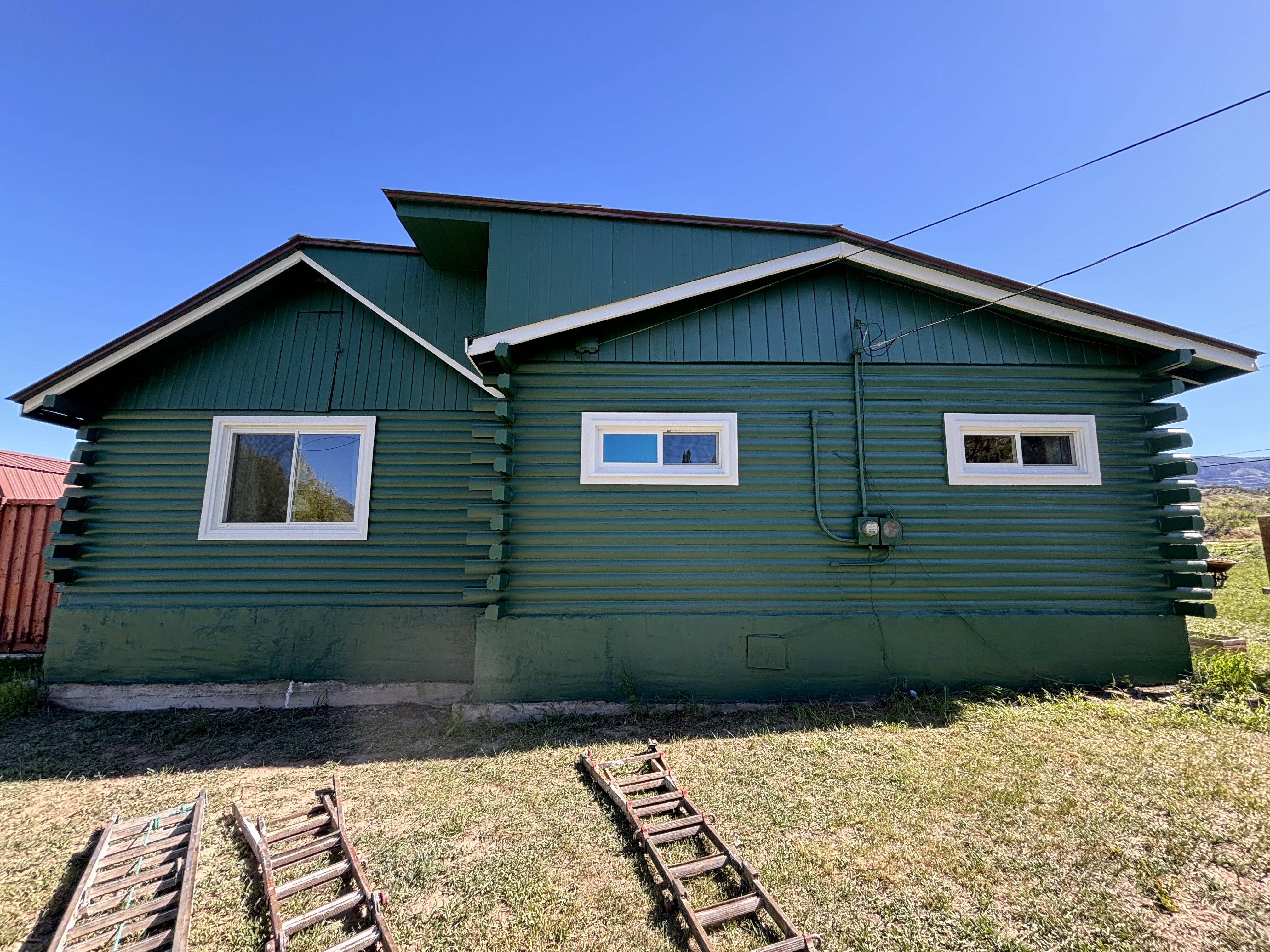 Log Home Staining & Restoration project by Mountain Man Painting in Colorado