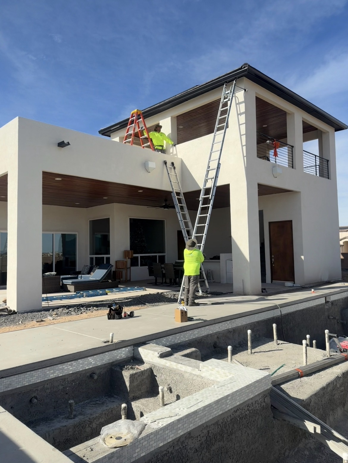 Aluminum gutter installed along the roof edge to collect rainwater.