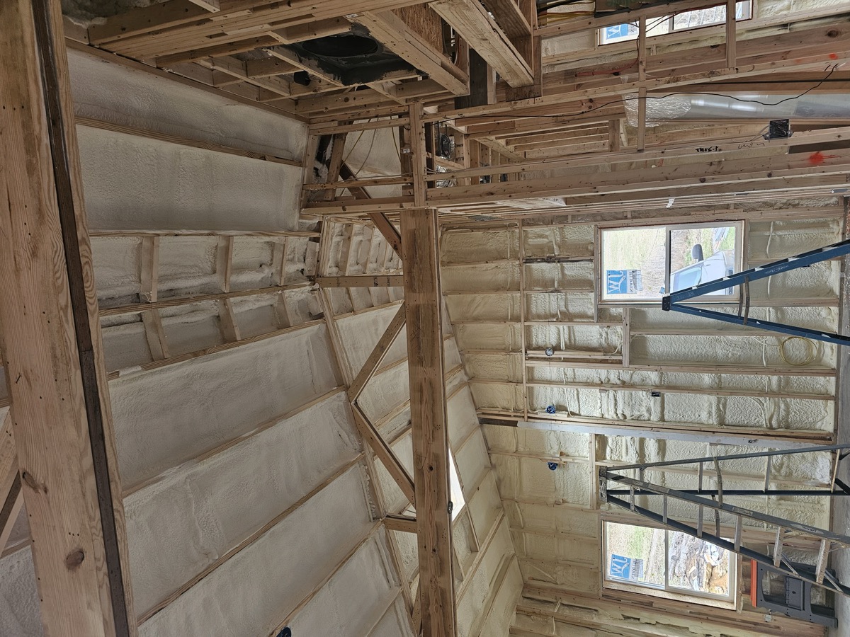 Full-home spray foam insulation — walls and ceiling completely insulated