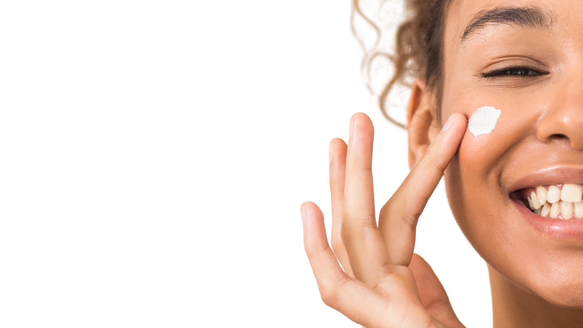 Happy woman with healthy glowing skin using JuJubee natural skincare New York