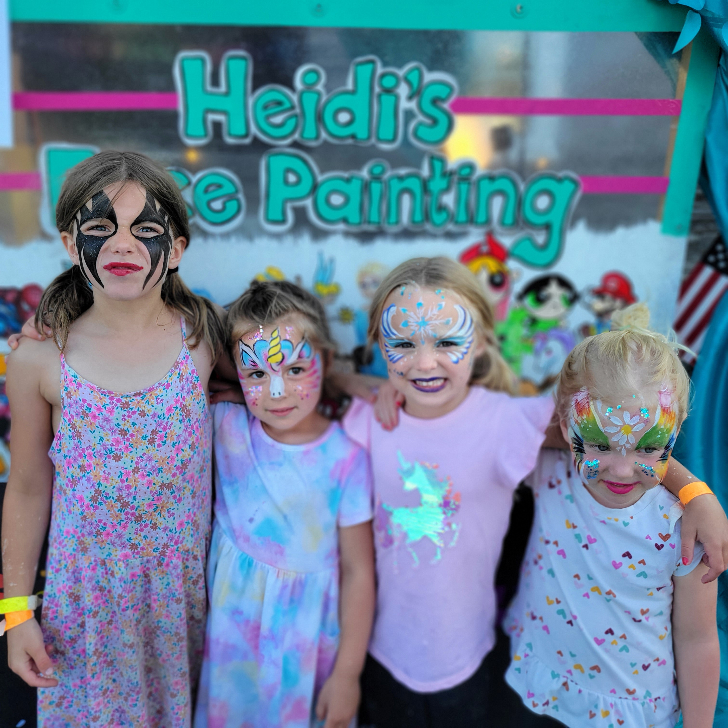 Kids with face paint at the 4th at Big Rock Creek
