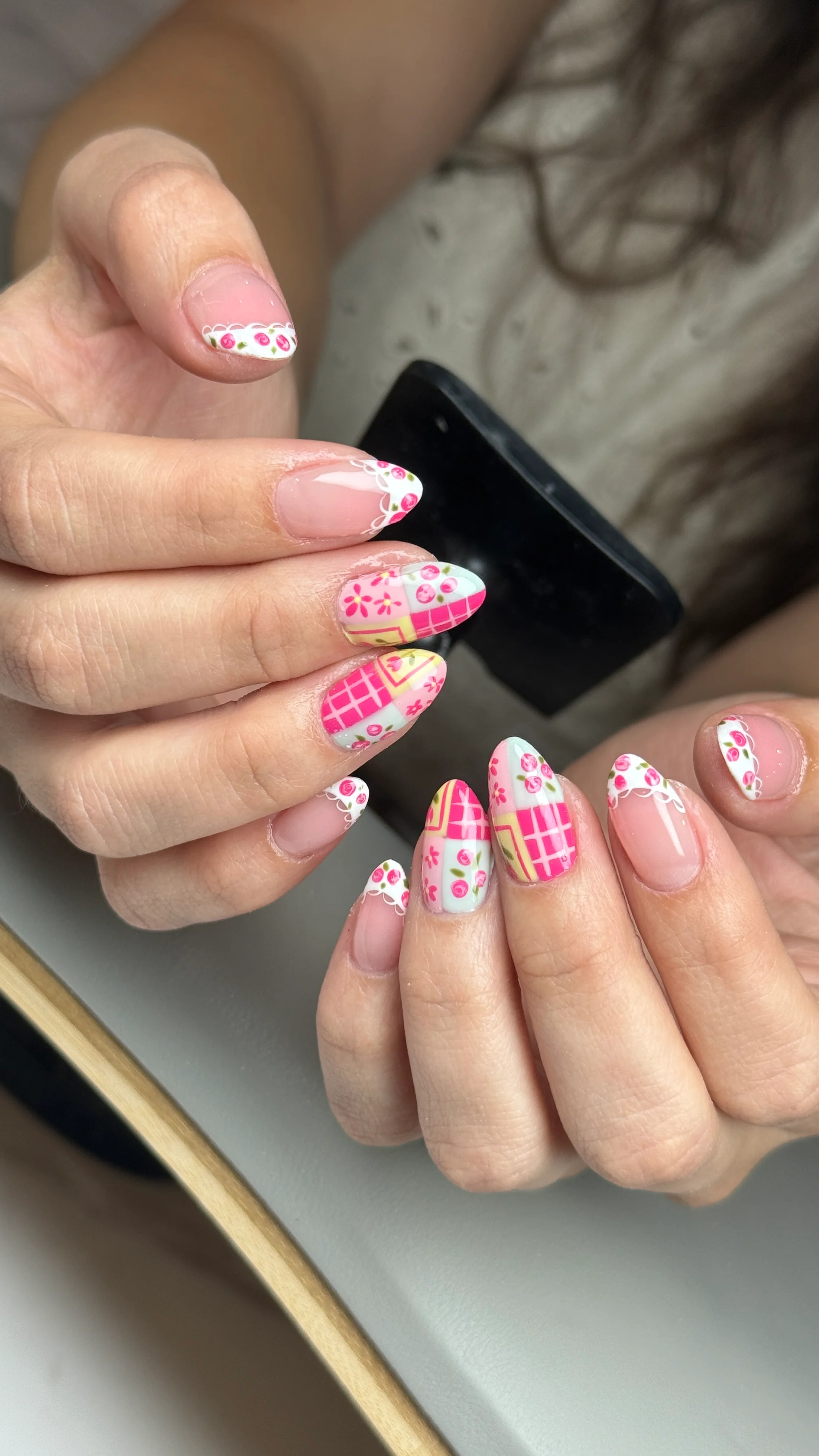 pink strawberry picnic nail design with plaid, flowers, and French tips by Ballerina Nails and Spa