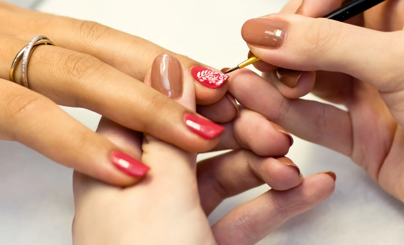 A client showing refreshed poly gel nails after a refill