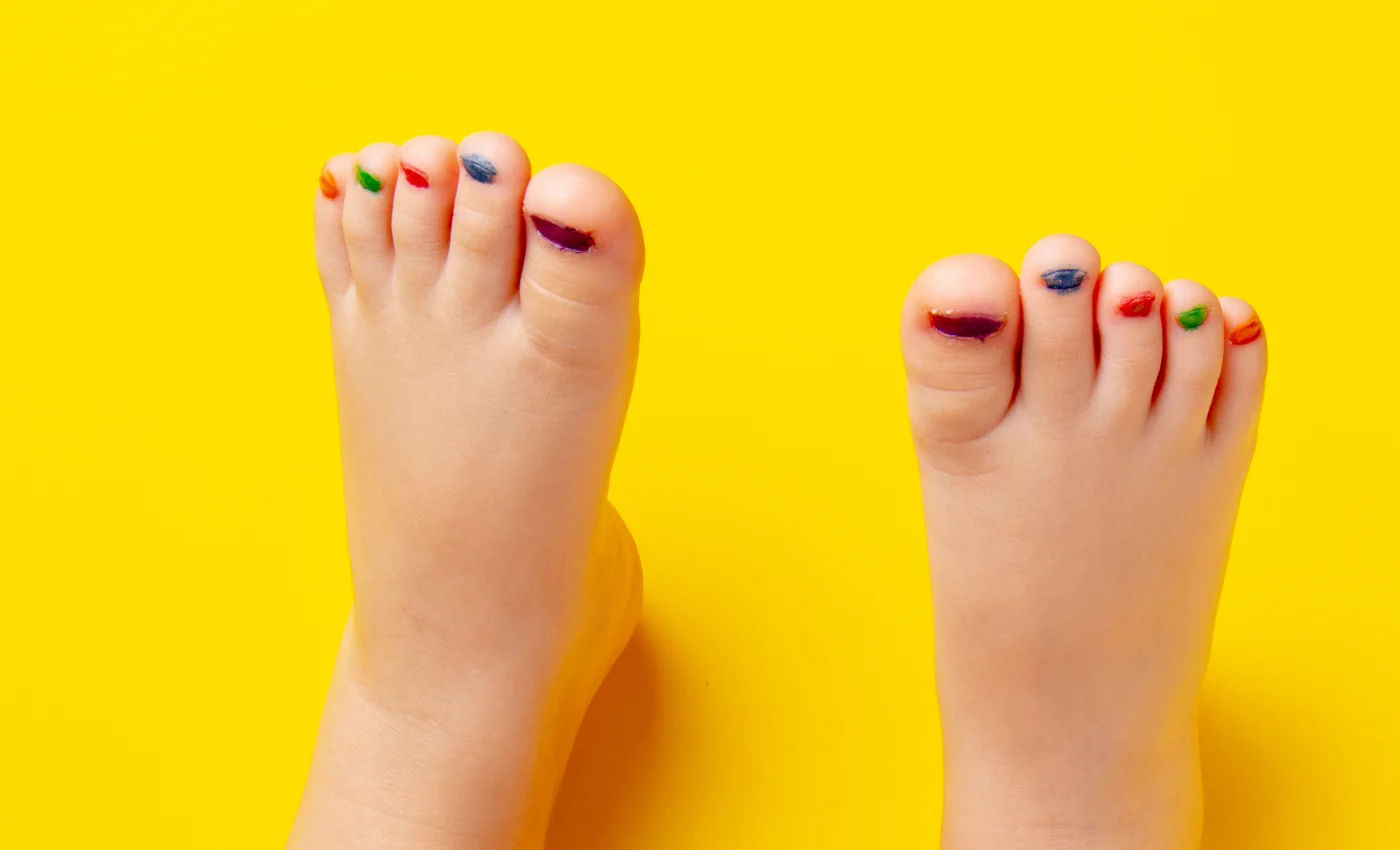 A younger guest receiving a gentle junior pedicure service