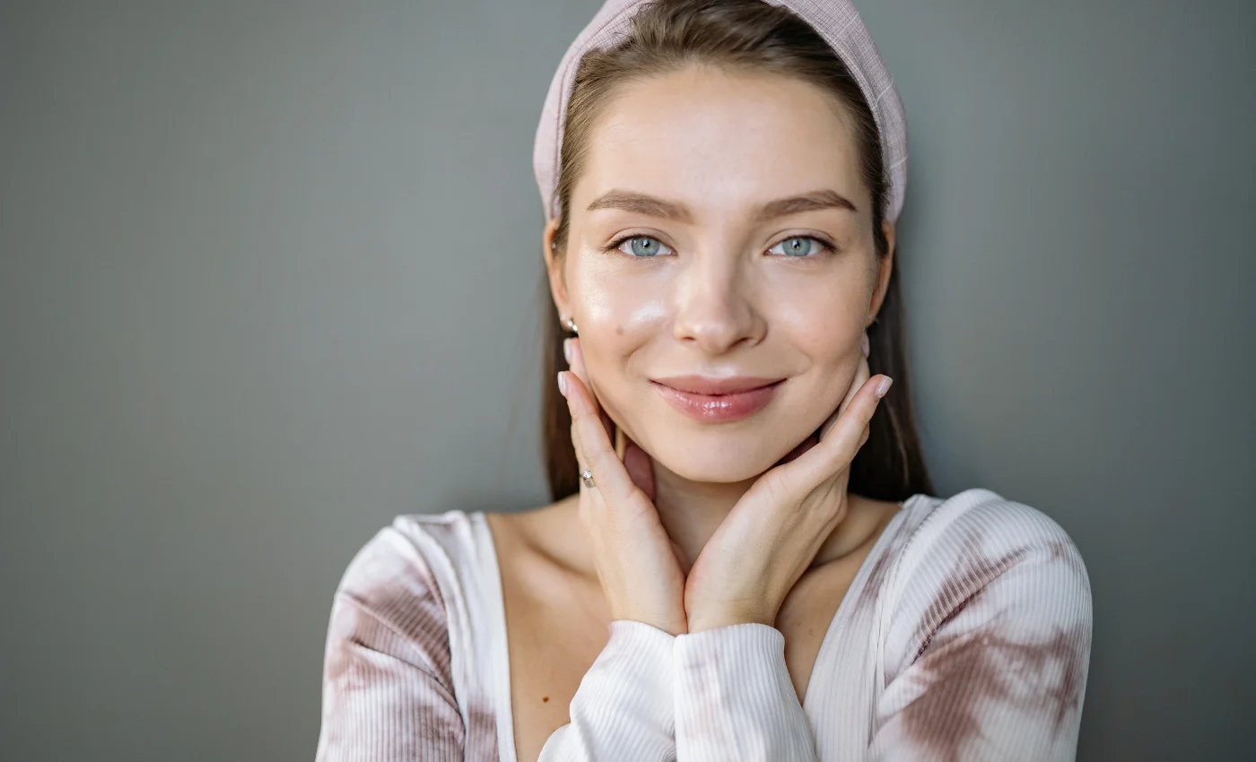 A client with smooth skin after a full face wax