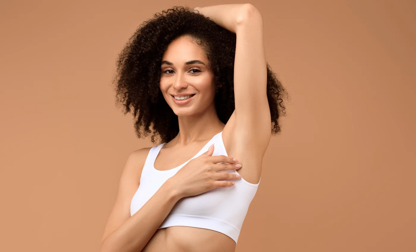 A client with smoother arms after a full arm wax