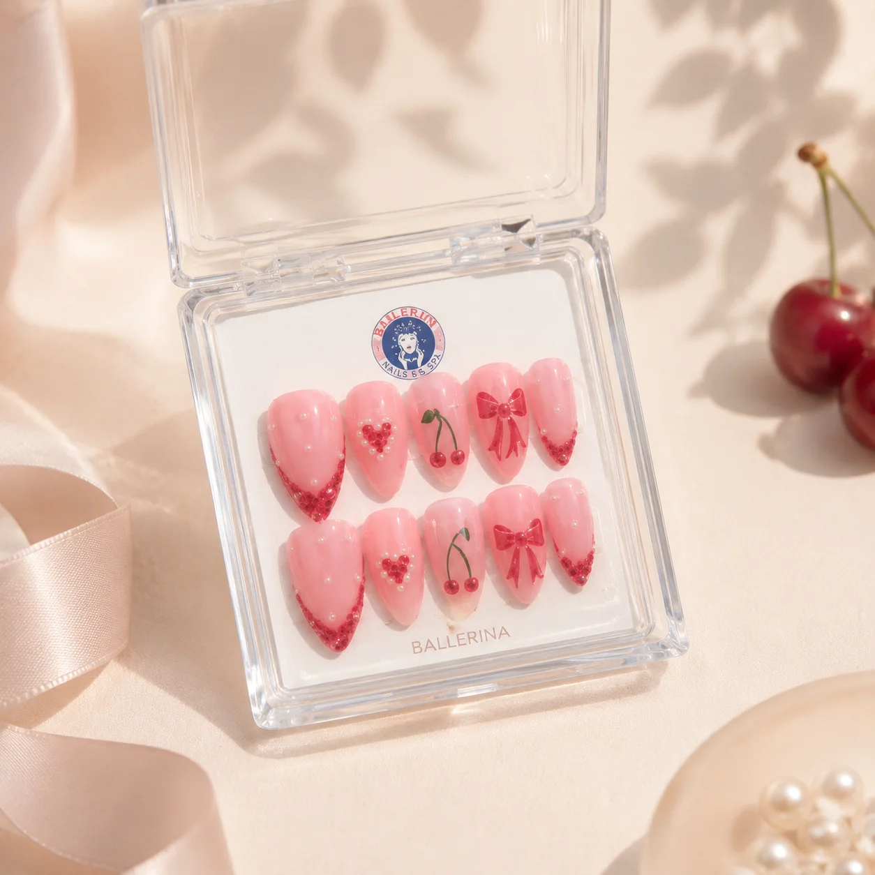 Custom press-on nails displayed in a Nailbox package