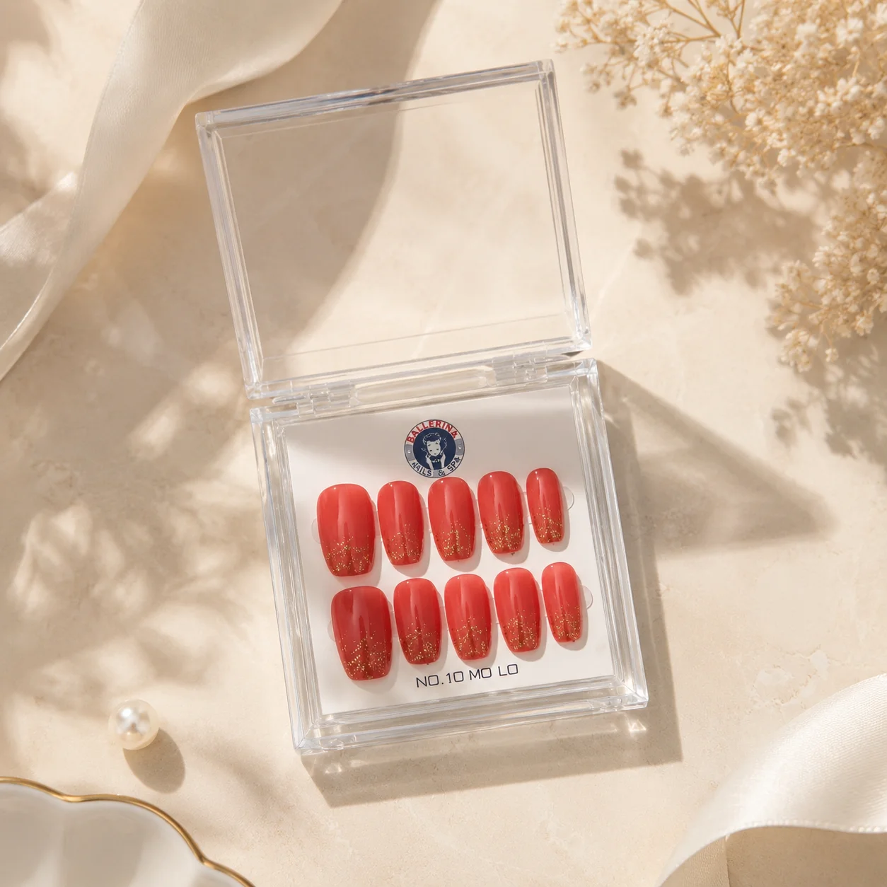 Close-up of a custom Nailbox press-on nail design
