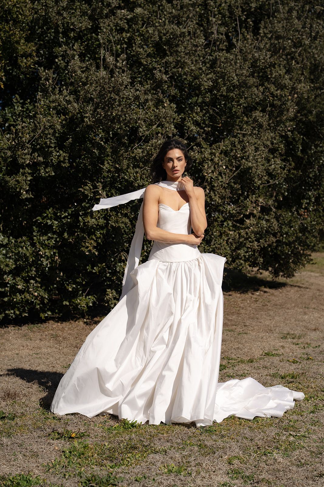 The Clara, a drop waist gown with a long silk sash