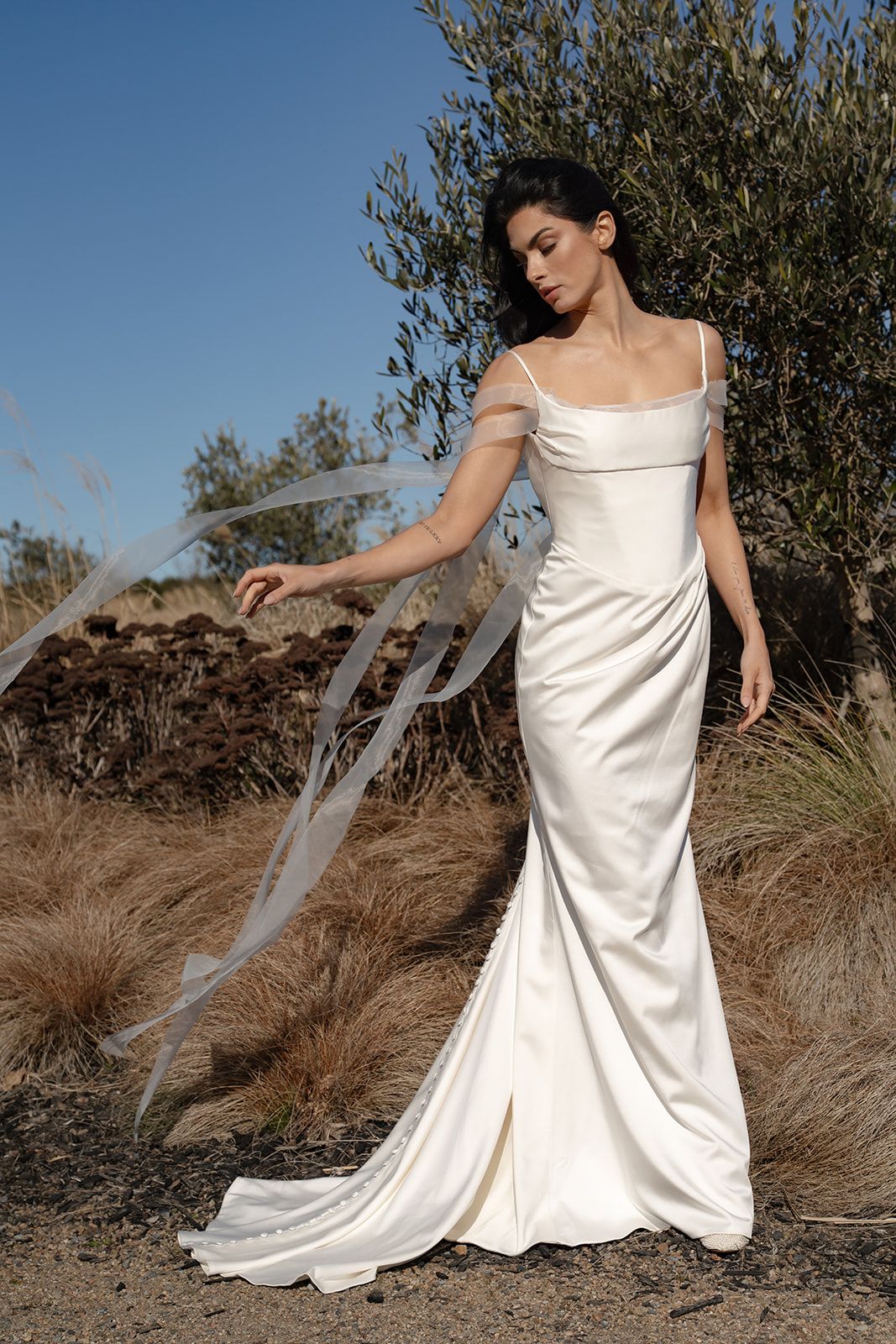 The Cosette, a satin column gown with fine straps