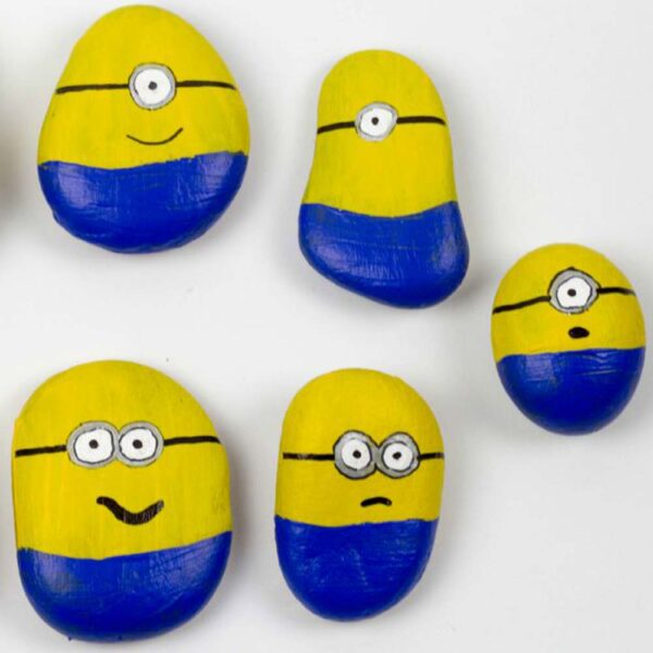 Painted minion rocks craft project at a My Studio Party Arts & Crafts Party