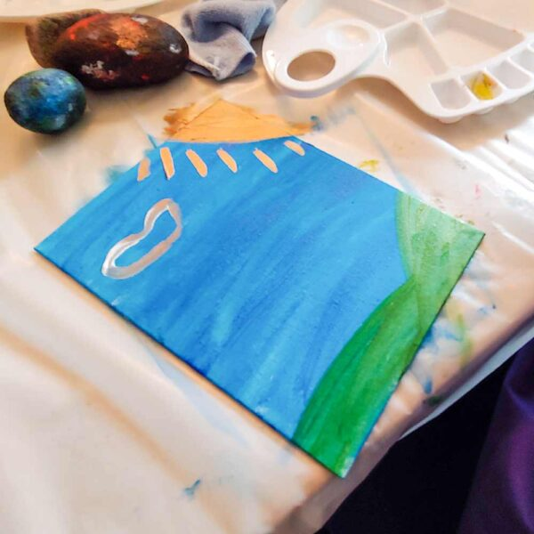 Kid's finished acrylic painting on canvas at a My Studio Party Paint Star Party