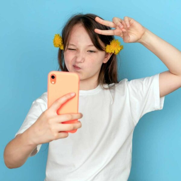 Kid taking a selfie video at a My Studio Party TikTok Star Party